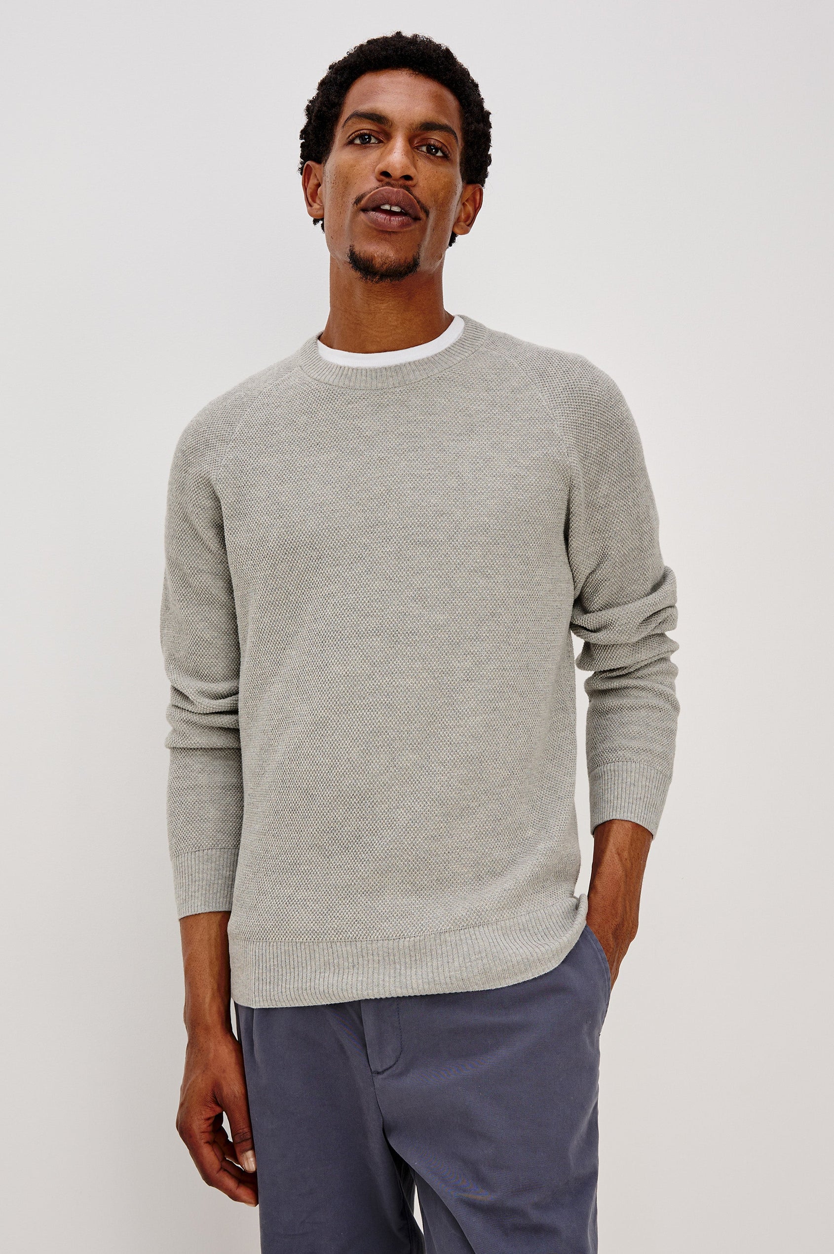 Vann long sleeve crew neck sweater in Grey Heather Colorway. Front View on Model Shown.