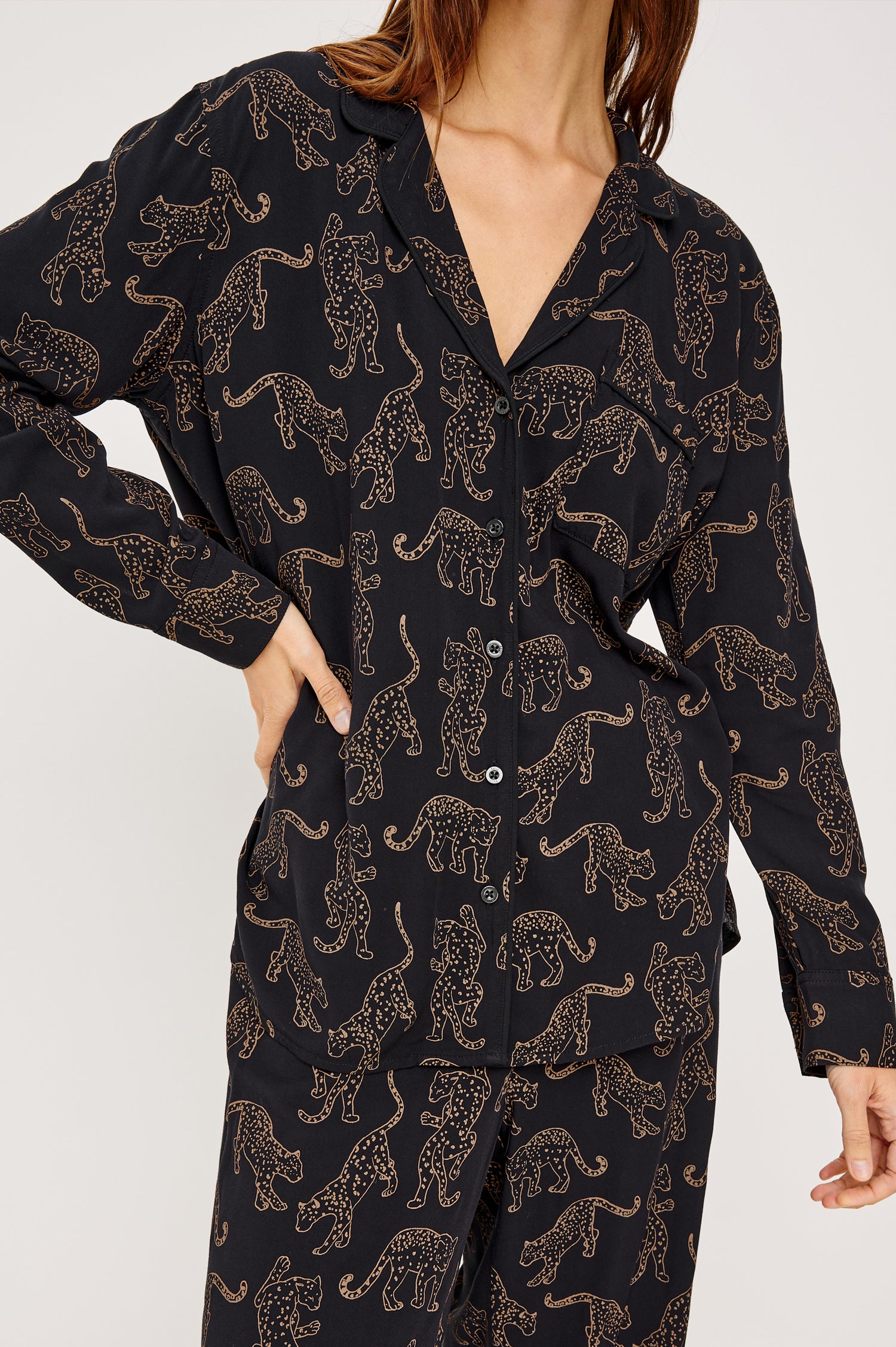 Varra Pajama Set in Jersey With Contrast Piping Button-Up Shirt With Notched Collar and Long Sleeves and Matching High-Waisted Pants With Adjustable Waist Drawstring Ties in Loose Fit in Tan Jaguars Colorway - Upper Body Close Up Front View Featured on Model