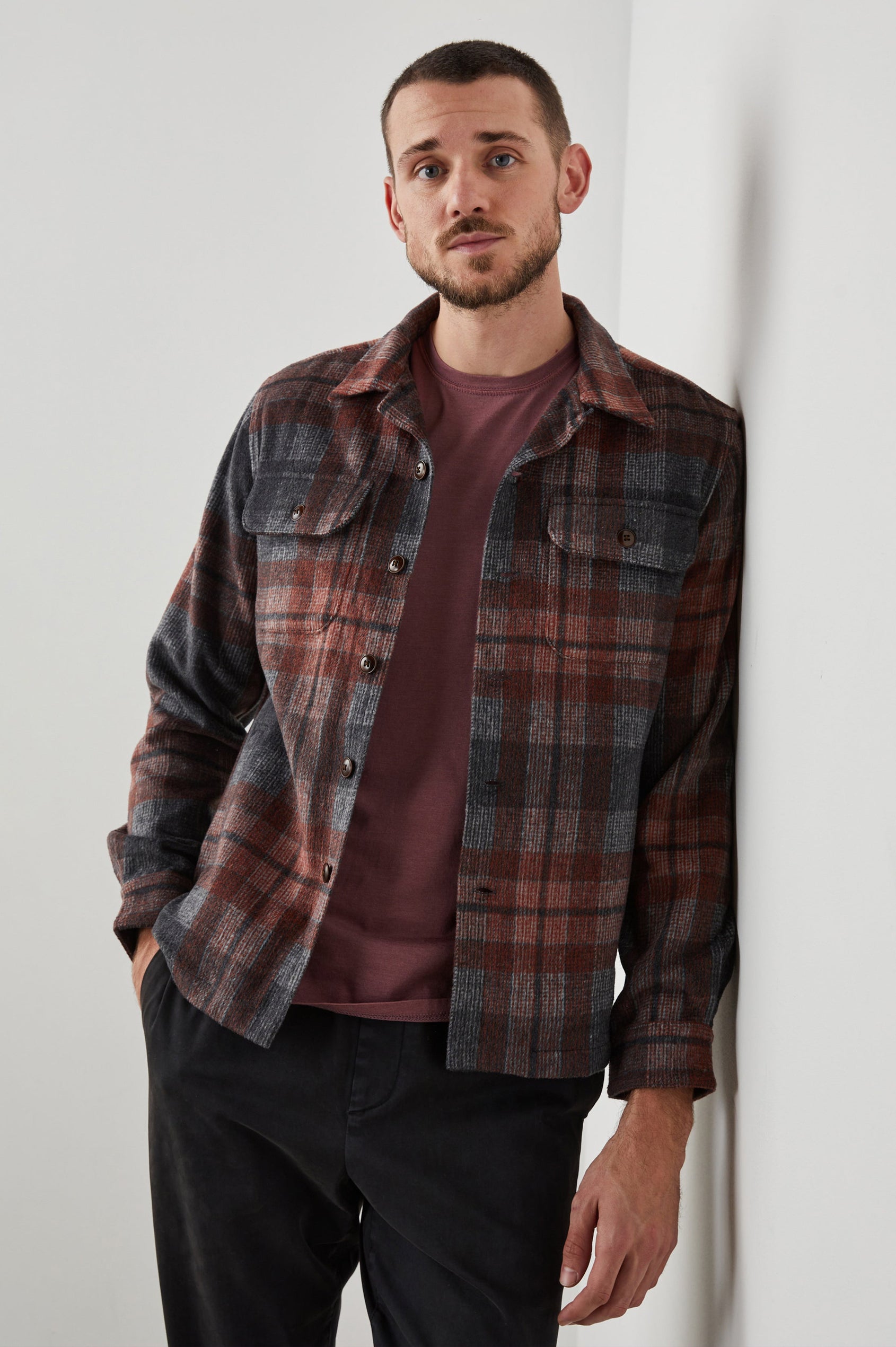 Viggo Long-Sleeve Shirt Jacket with Button Closure and Two Button Chest Flap Pockets in Crimson Shadow Plaid Colorway - Front Unbuttoned View Featured on Model