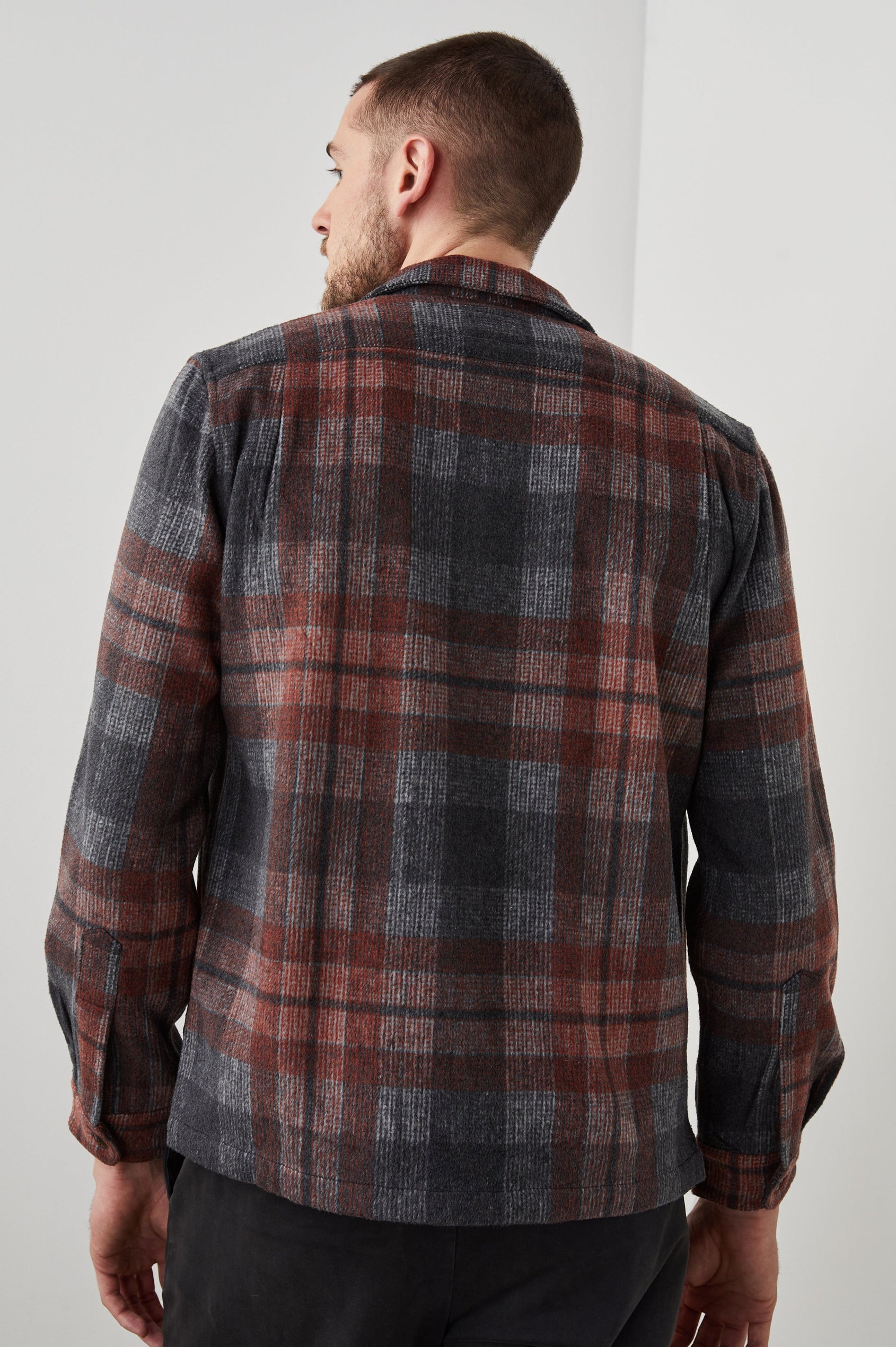 Viggo Long-Sleeve Shirt Jacket with Button Closure and Two Button Chest Flap Pockets in Crimson Shadow Plaid Colorway - Back Unbuttoned View Featured on Model