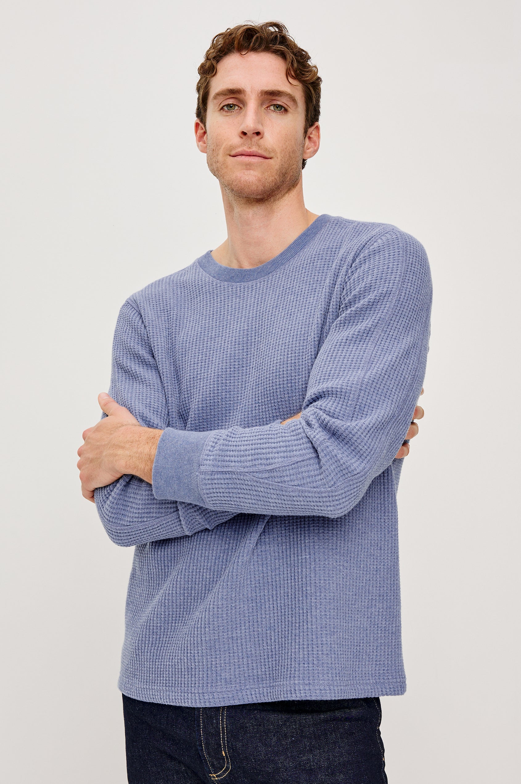 Wade Long-Sleeve Waffle Knit Thermal with a Crew Neck in Blue Heather Colorway. Front View Featured on Model.