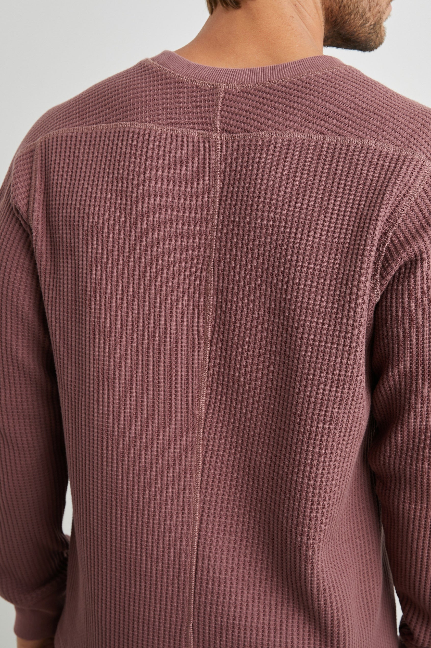 Wade Long-Sleeve Waffle Knit Thermal with a Crew Neck in Brick Colorway - Back View Featured on Model