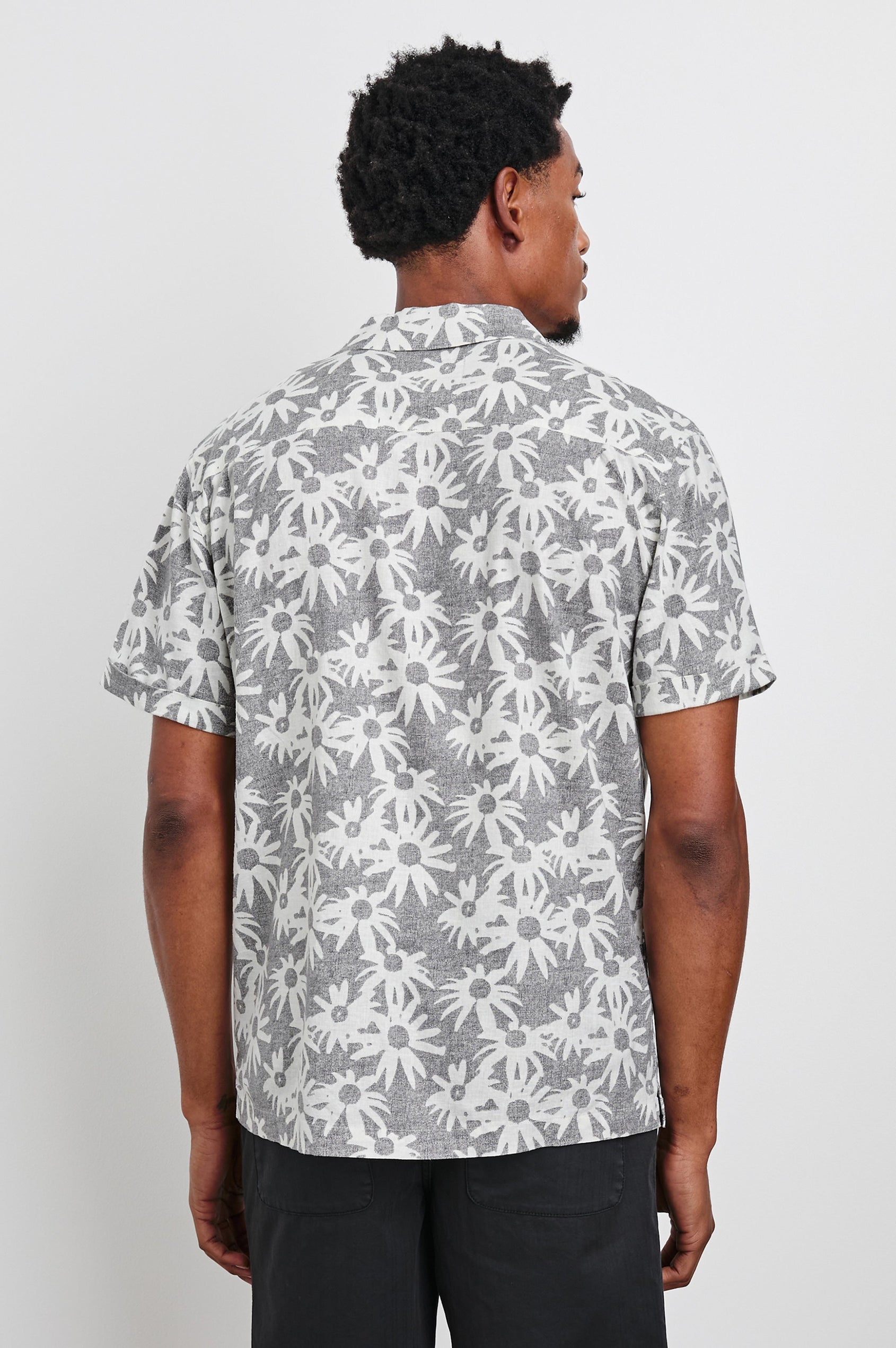 Waimea short sleeve button down shirt with camp collar and floral pattern details in Perennial Charcoal White - back view on model