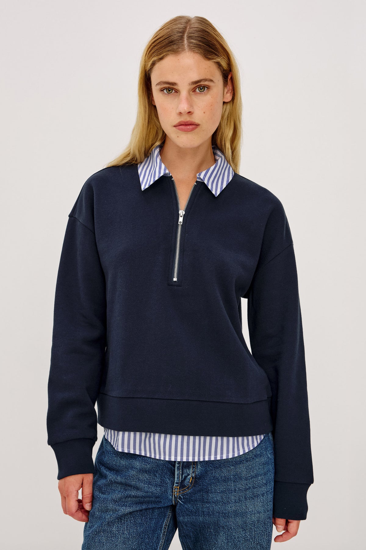 Waverly Sweatshirt in Soft Cotton With Half-Zip, Contrast Collar and Hem for Built-In Layering Effect, Relaxed, Boxy Fits, and Long Sleeves in Navy Colorway - Upper Body Front View Featured on Model.