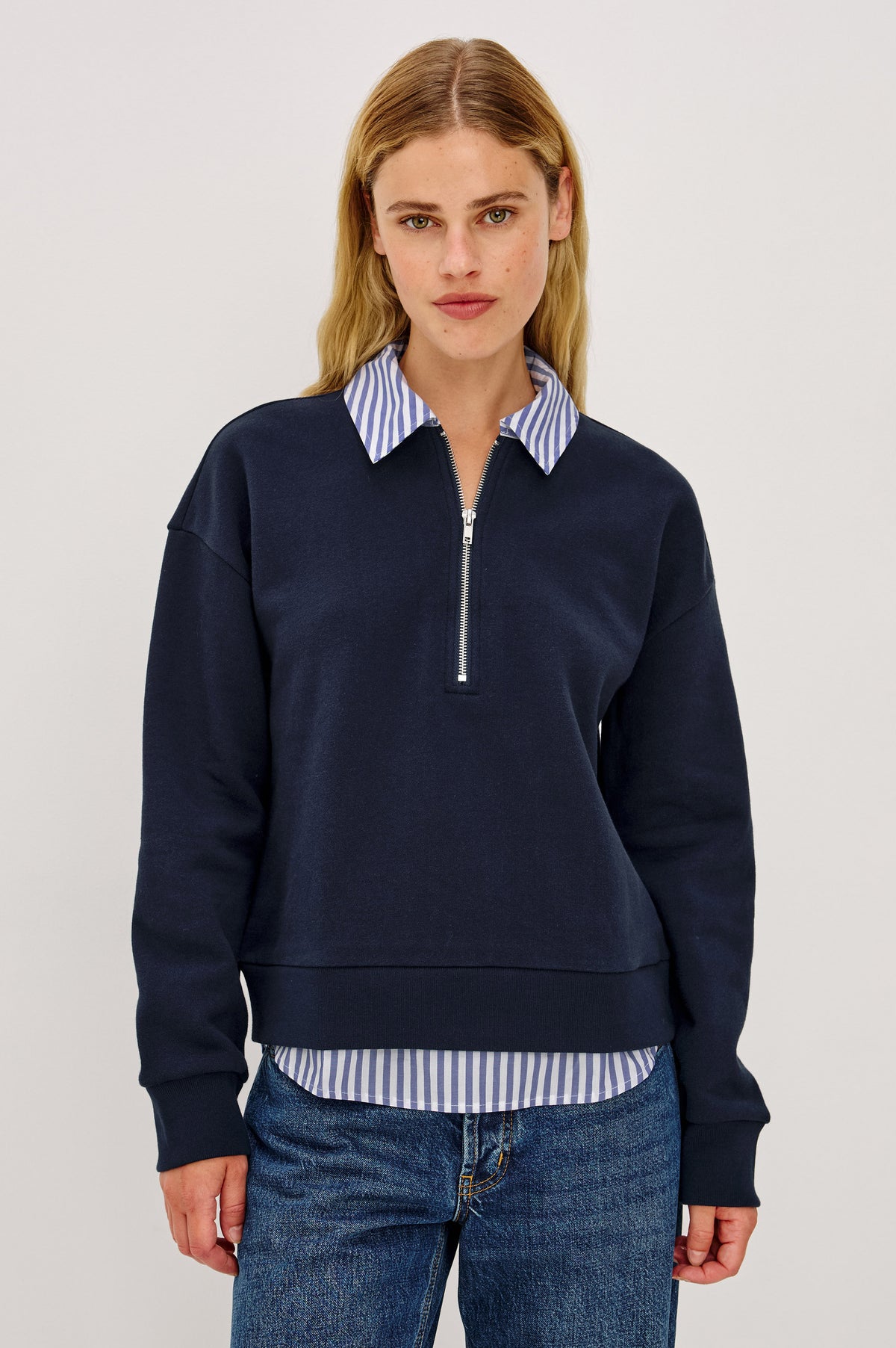Waverly Sweatshirt in Soft Cotton With Half-Zip, Contrast Collar and Hem for Built-In Layering Effect, Relaxed, Boxy Fits, and Long Sleeves in Navy Colorway - Front View Featured on Model.
