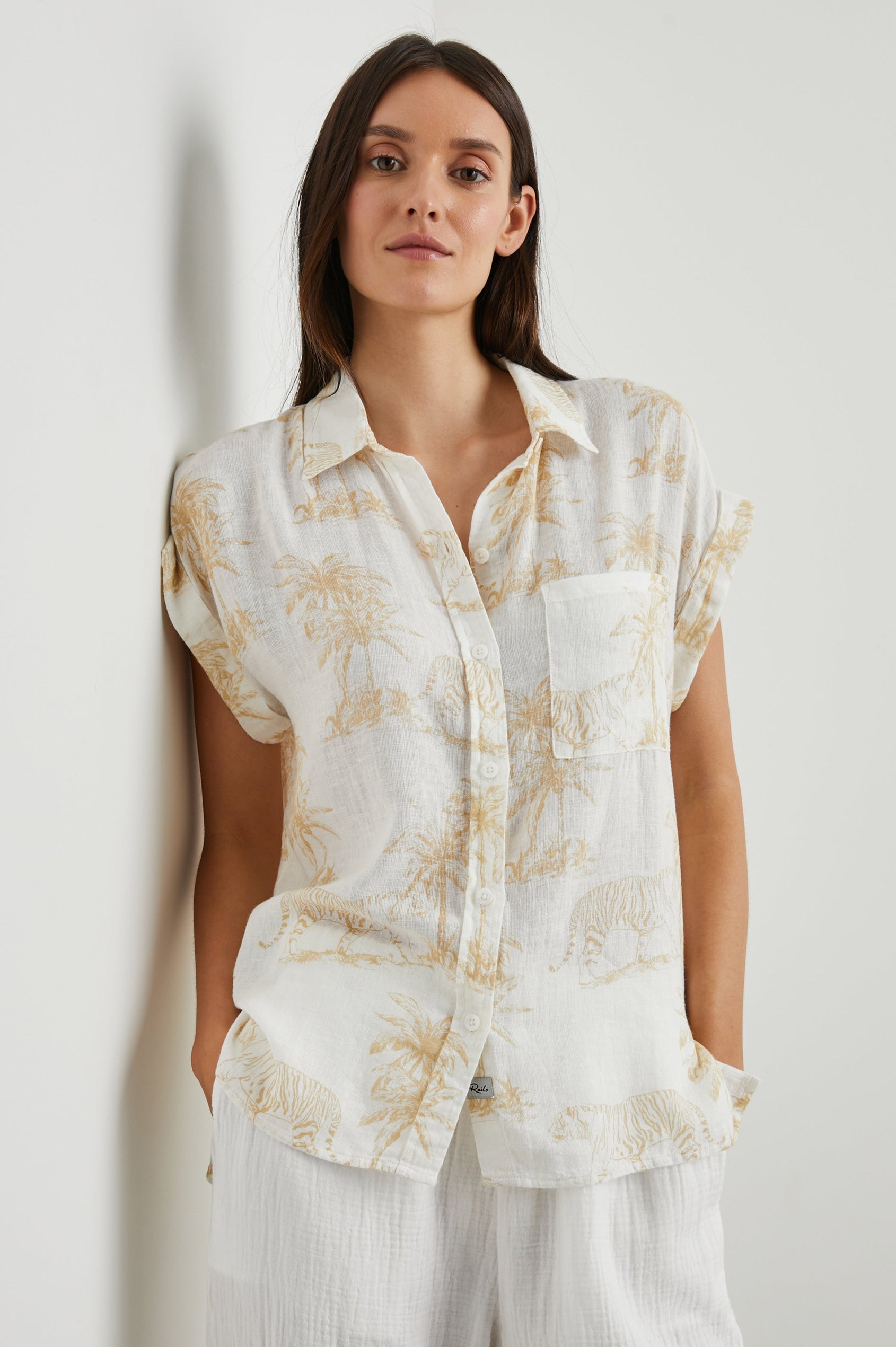 Whitney Short Rolled Sleeves Button Up with a Chest Patch Pocket and Short Side Slits in Wild Bengals Colorway, with brown bengals and trees on cream - Front View Featured on Model