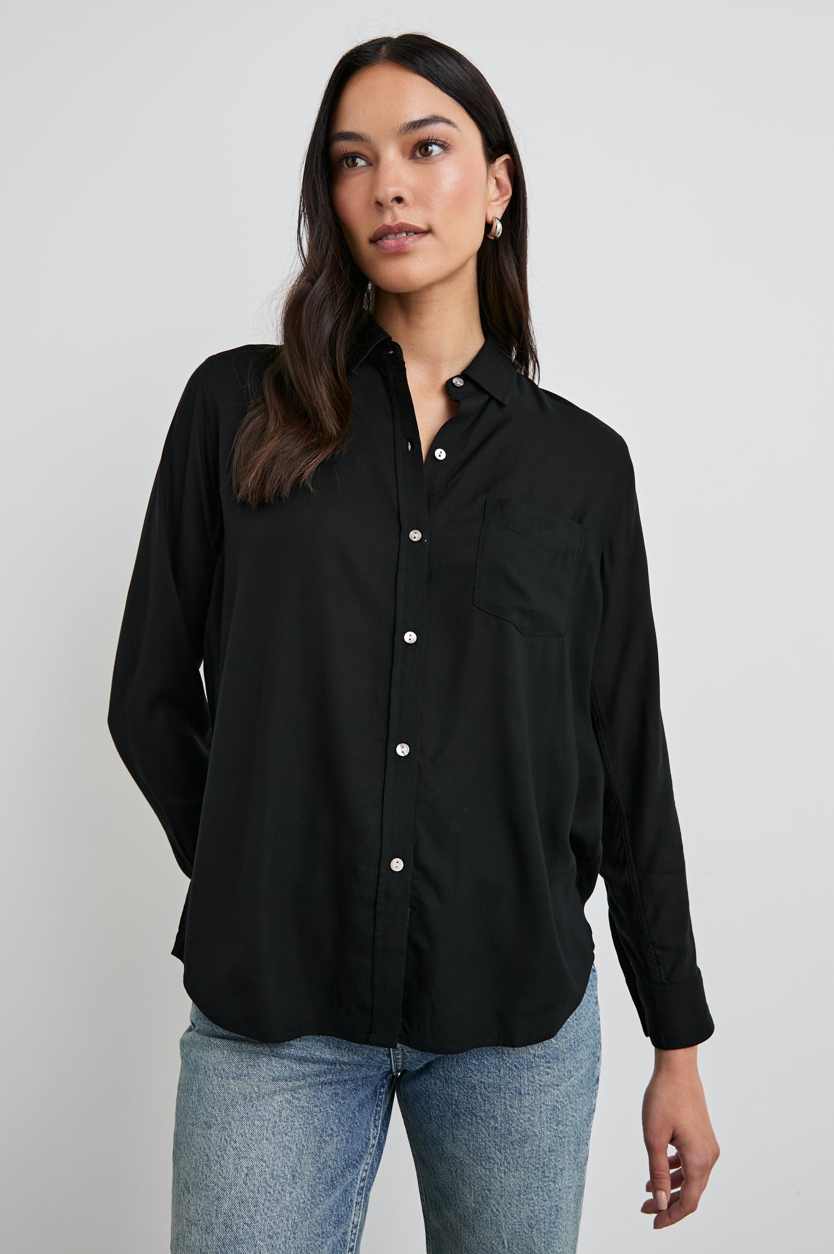 Wren Long-Sleeve Button Up with Chest Patch Pocket in Black Colorway - Front View Featured on Model