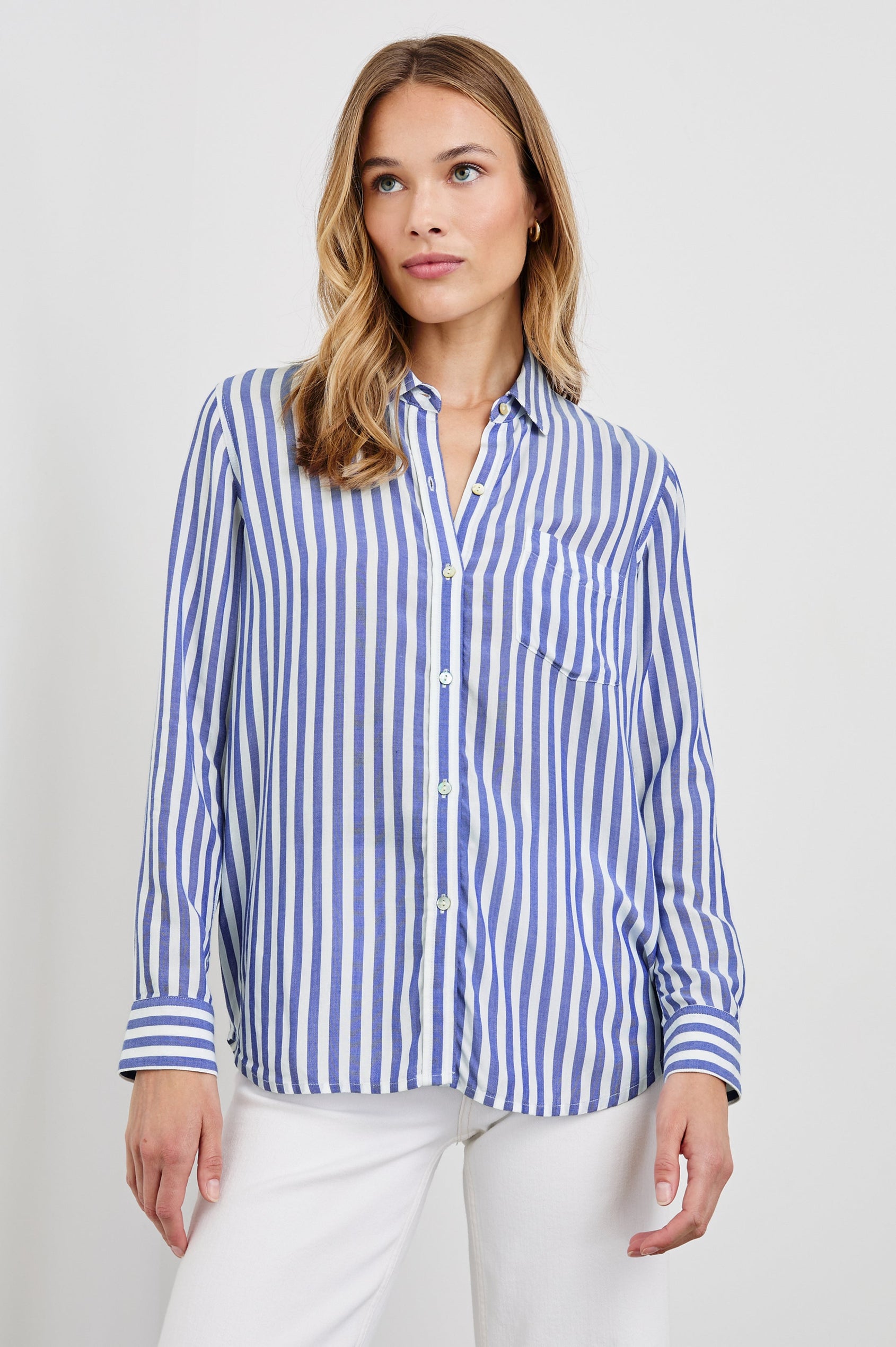 Wren Long-Sleeve Button Up with Chest Patch Pocket in Blue White Colorway, vertical stripes - Front View Featured on Model