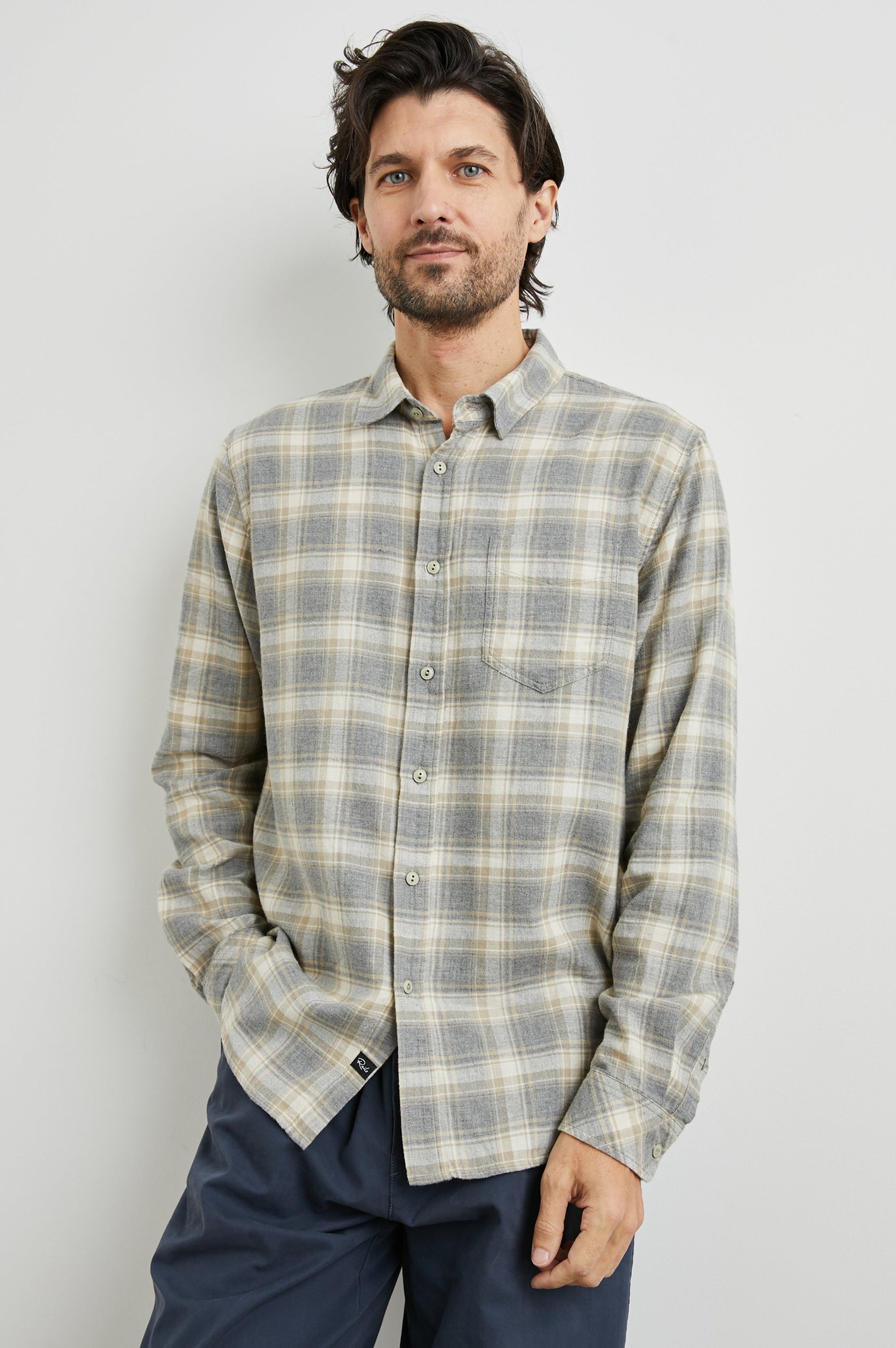 Wyatt Long-Sleeve Button Up with a Chest Patch Pocket in Charcoal Desert Melange Colorway, a charcoal, desert and cream plaid - Front View Featured on Model
