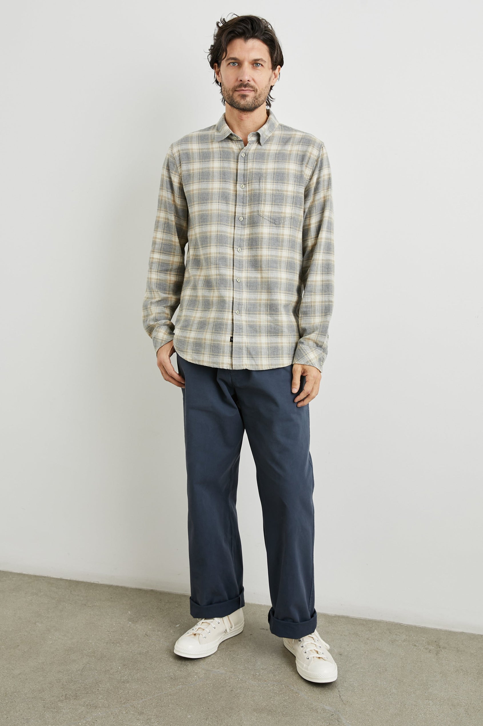 Wyatt Long-Sleeve Button Up with a Chest Patch Pocket in Charcoal Desert Melange Colorway, a charcoal, desert and cream plaid - Front Full Body View Featured on Model