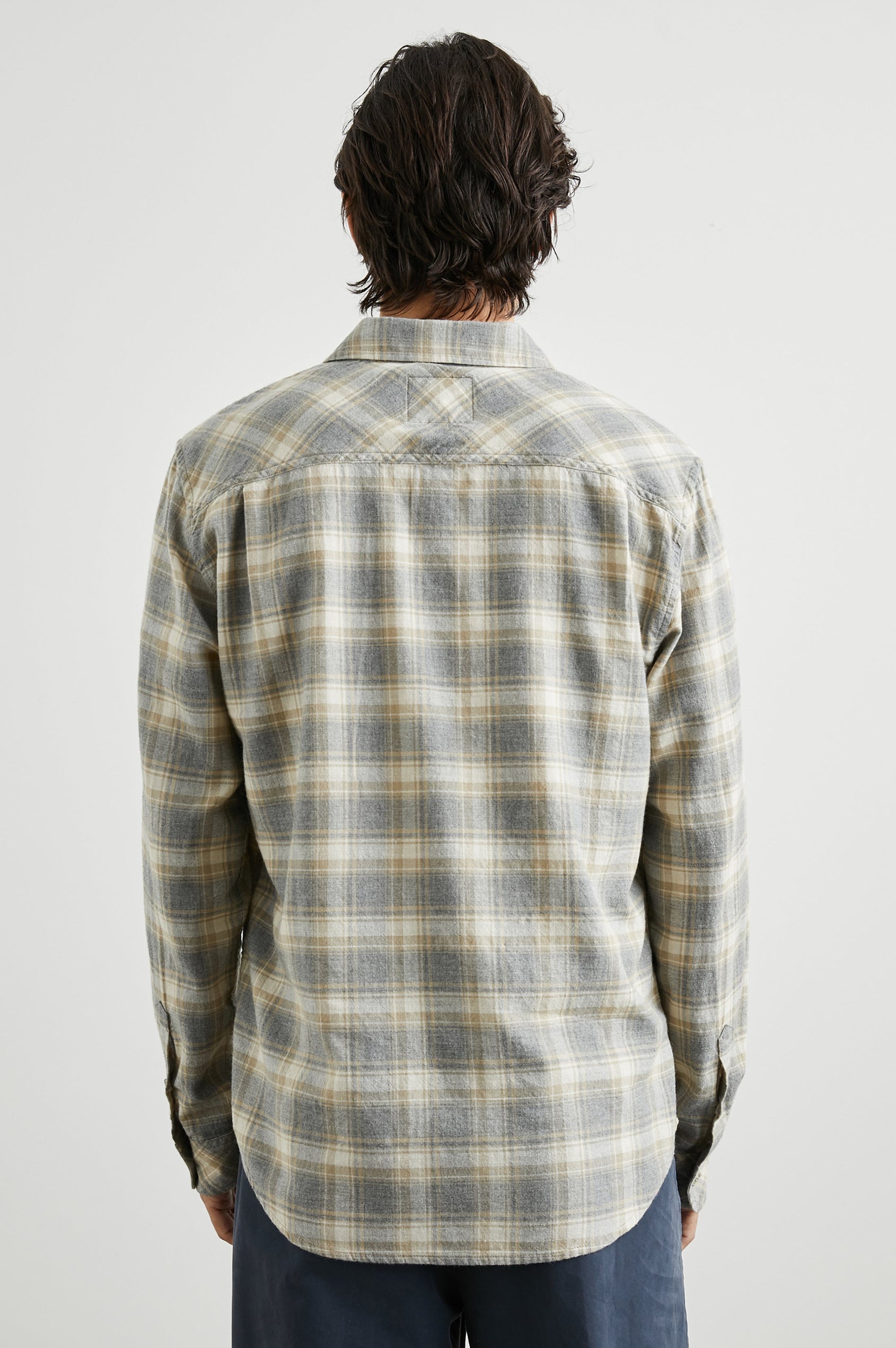Wyatt Long-Sleeve Button Up with a Chest Patch Pocket in Charcoal Desert Melange Colorway, a charcoal, desert and cream plaid - Back View Featured on Model