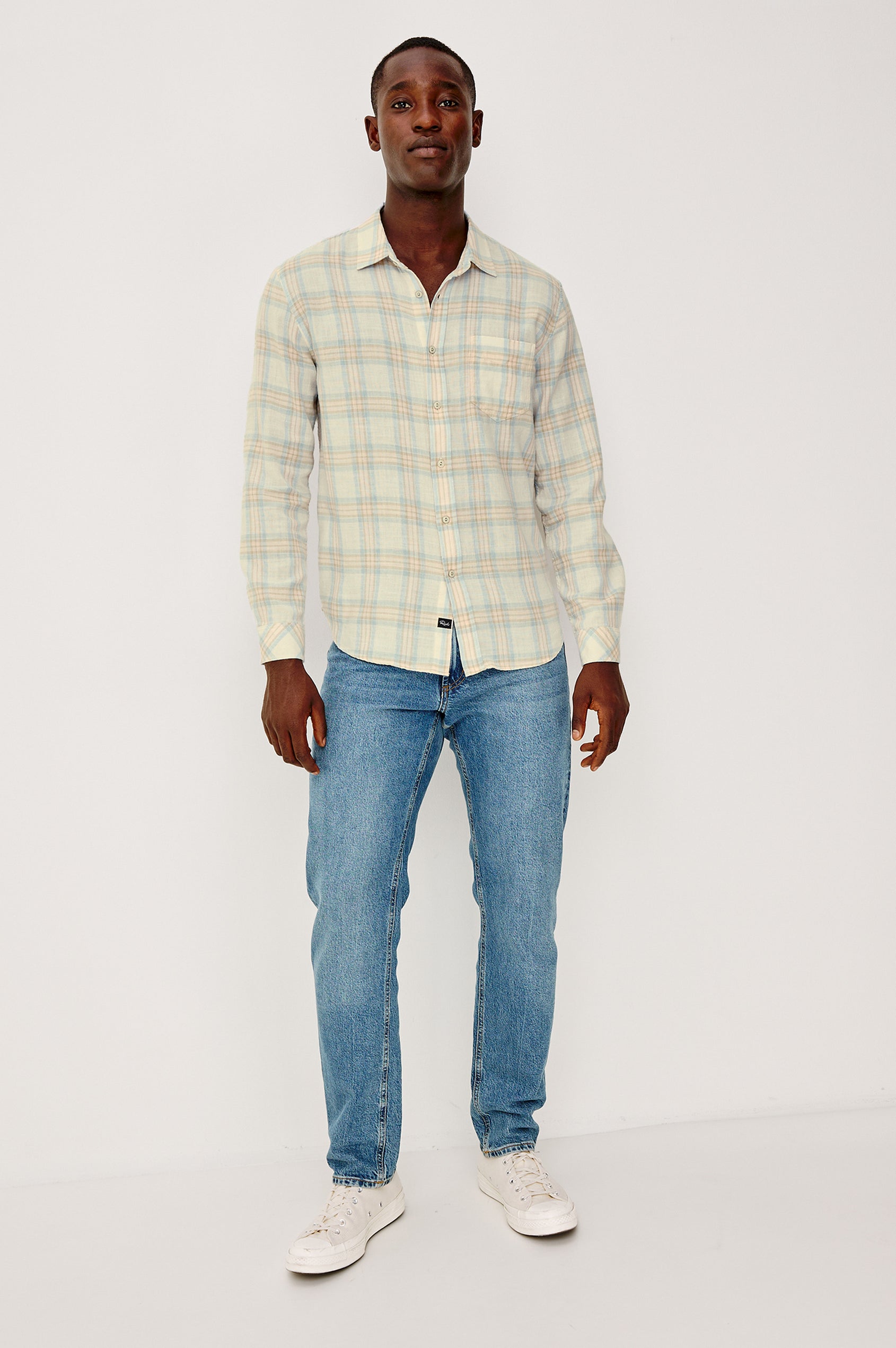 Wyatt Button Front Collared Shirt With Long Sleeves and Single Chest Pocket in Conch Shore Colorway - Full Body Front View Featured on Model