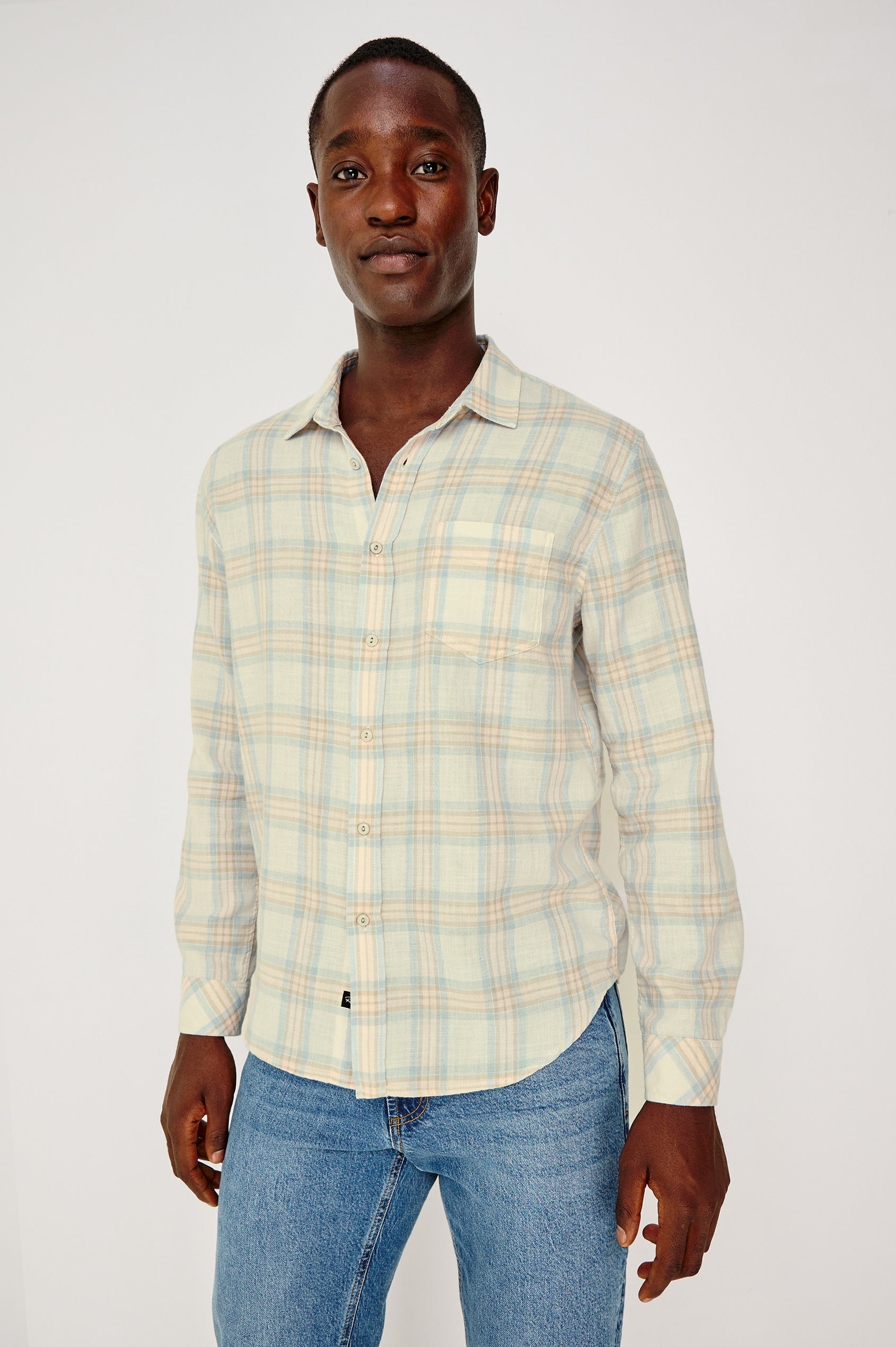 Wyatt Button Front Collared Shirt With Long Sleeves and Single Chest Pocket in Conch Shore Colorway - Upper Body Front View Featured on Model