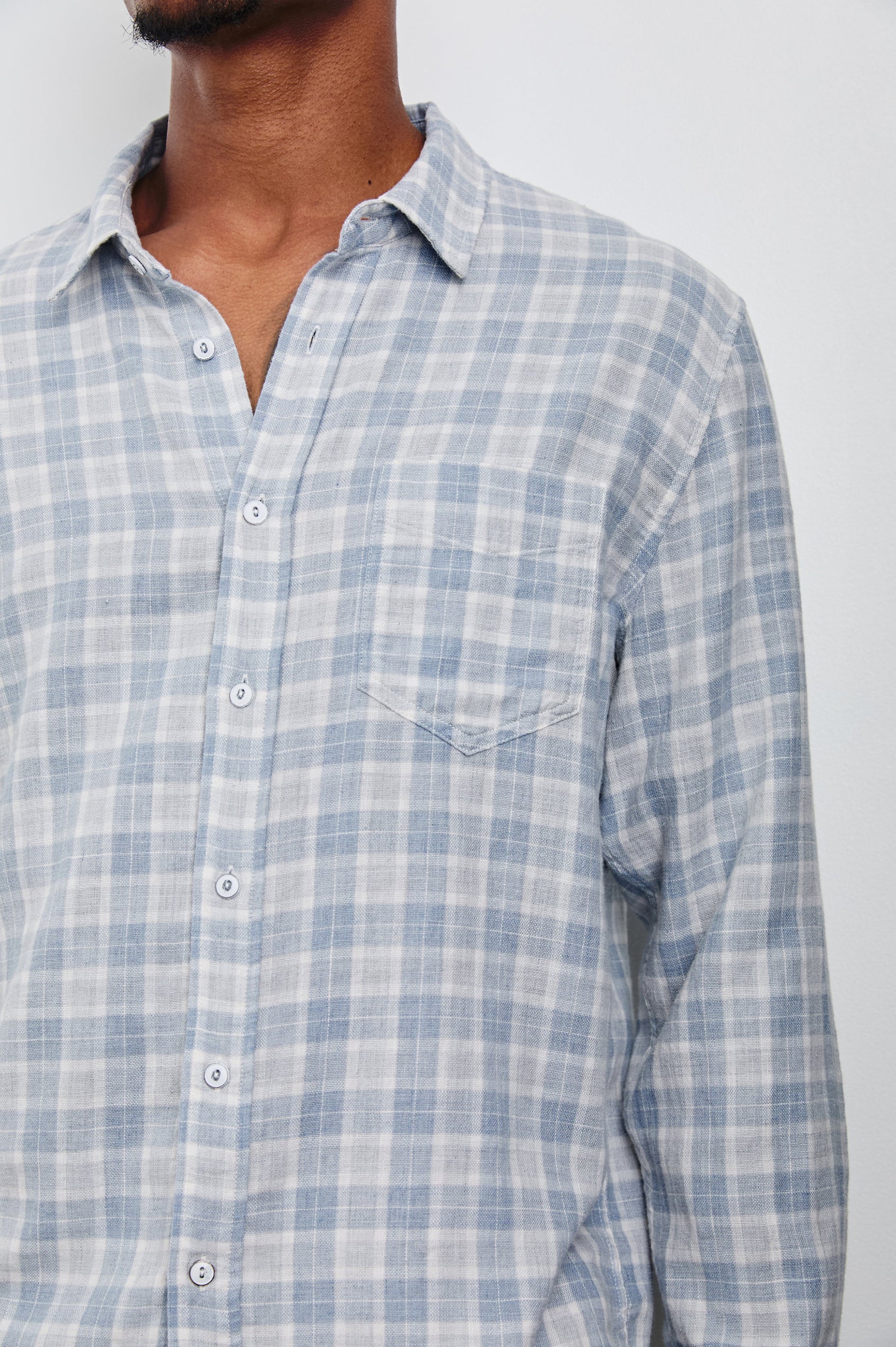 Wyatt Classic Button Up Long Sleeve Shirt with plaid print in Gentle Shore Melange - close up of details on model