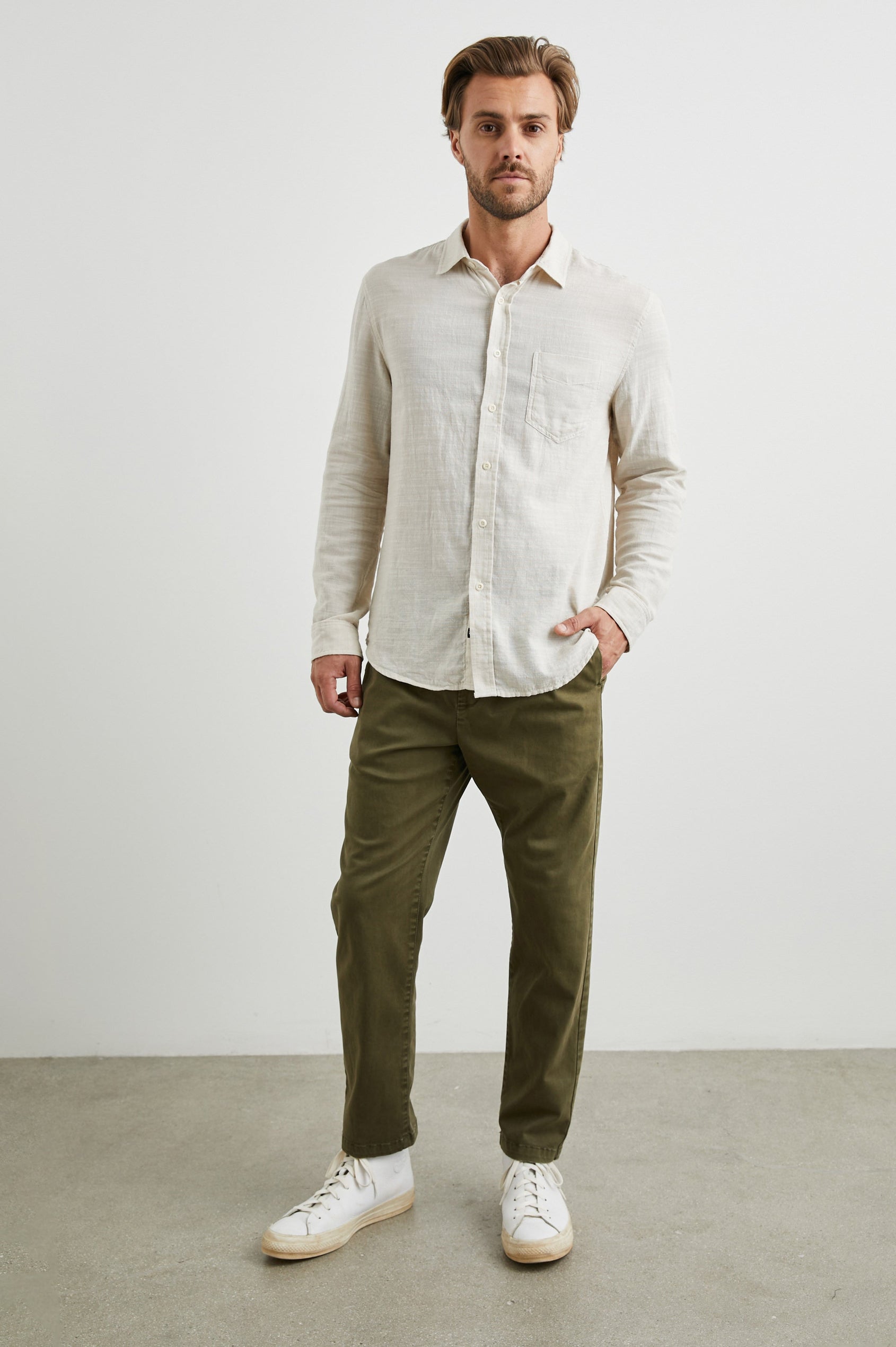 Wyatt Long-Sleeve Button Up with a Chest Patch Pocket in Hummus Colorway - Front Full Body View Featured on Model