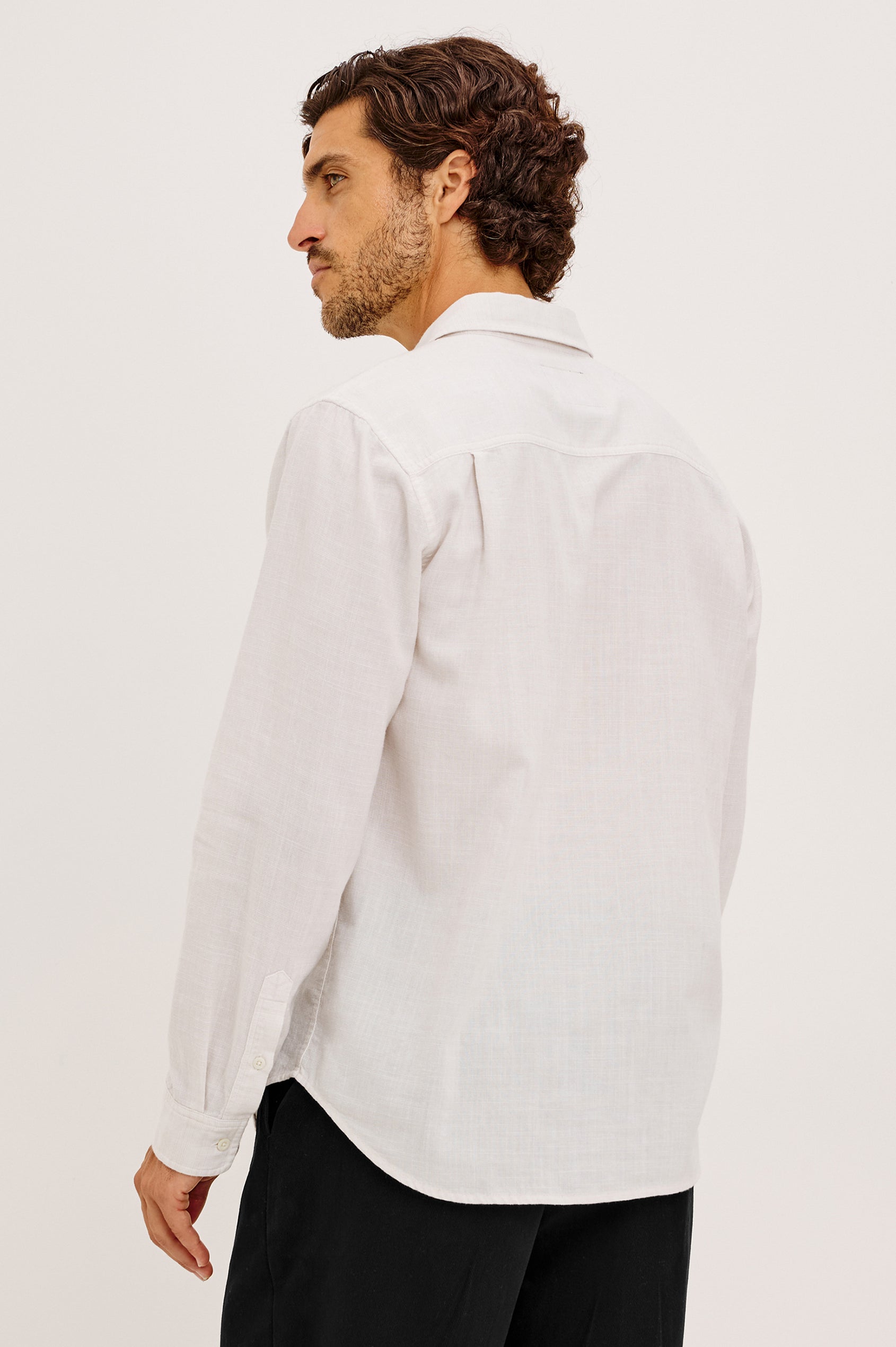 Wyatt Shirt in Cotton Slub Plainweave With Classic Fit, Collar, Button Front, Chest Patch Pocket, Long Sleeves, Shirttail Hem in Ivory Etch Colorway - Upper Body Back View Featured on Model
