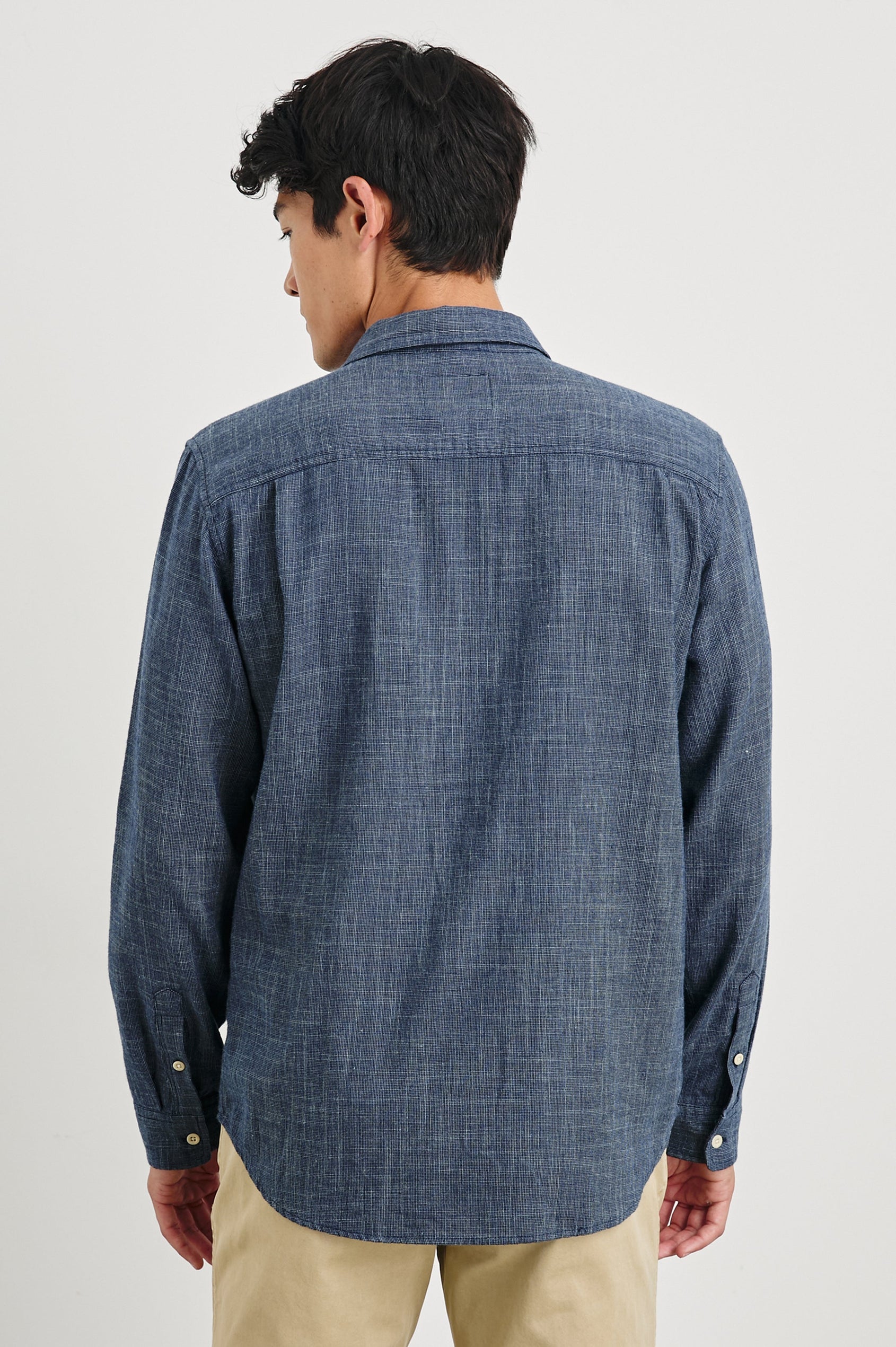 Wyatt Long-Sleeve Button Up with a Chest Patch Pocket in Navy Etch Colorway - Back View Featured on Model