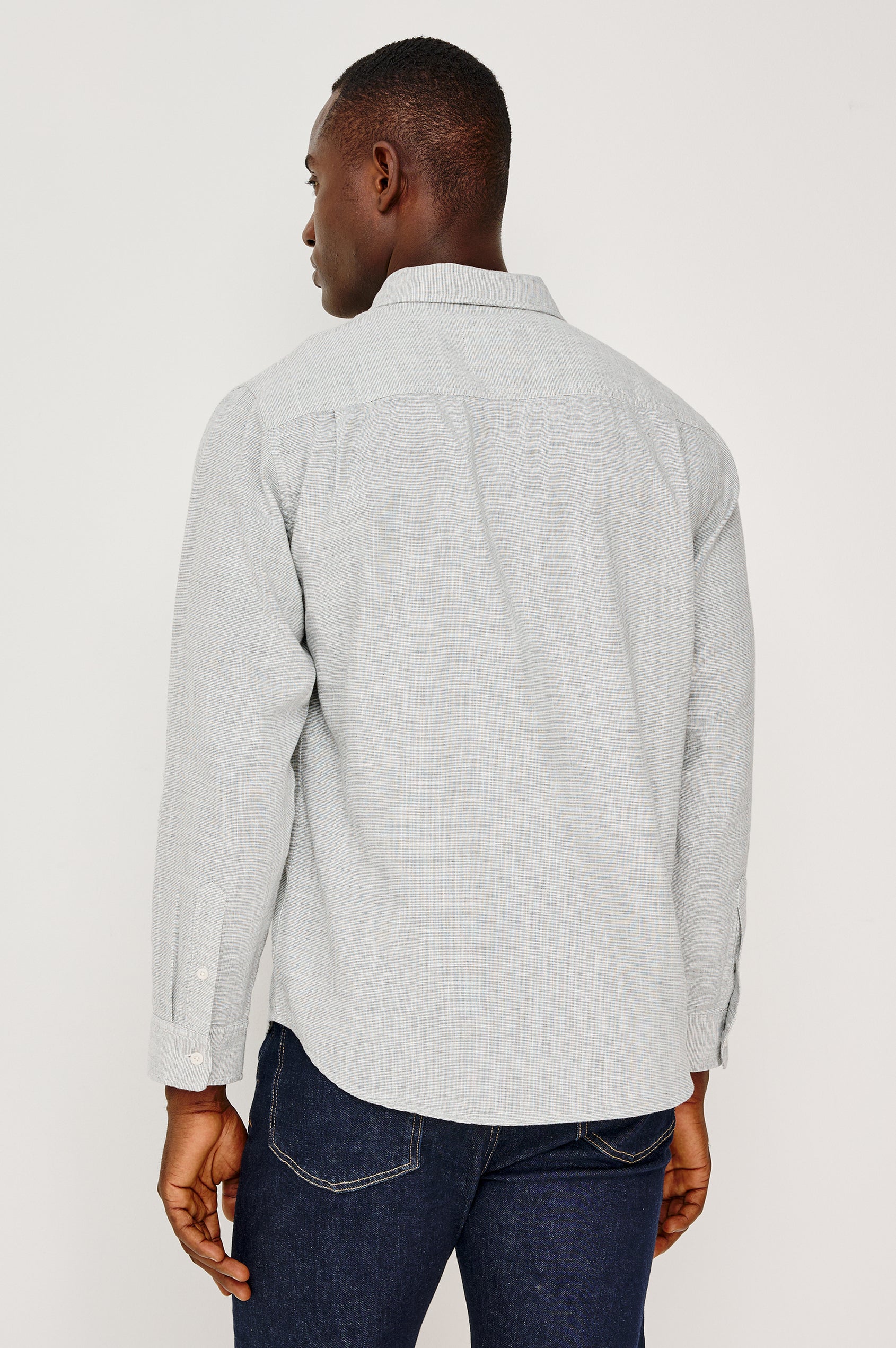 Wyatt Button Front Collared Shirt With Long Sleeves and Single Chest Pocket in Platinum Etch Colorway - Upper Body Back View Featured on Model