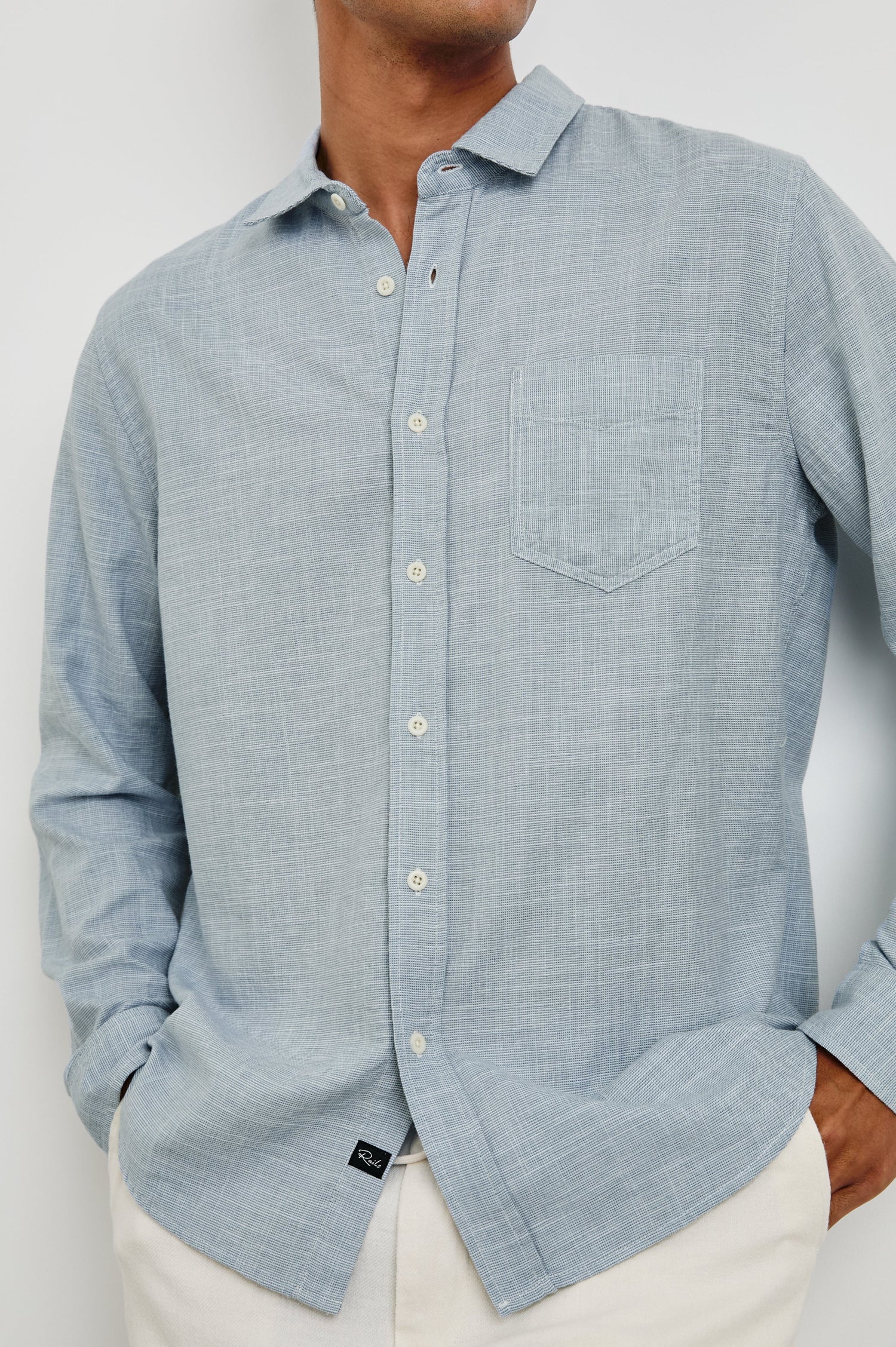 Wyatt Long-Sleeve Relaxed Fit Button Up with a Chest Patch Pocket in Tidal Etch Colorway - close up of details on model