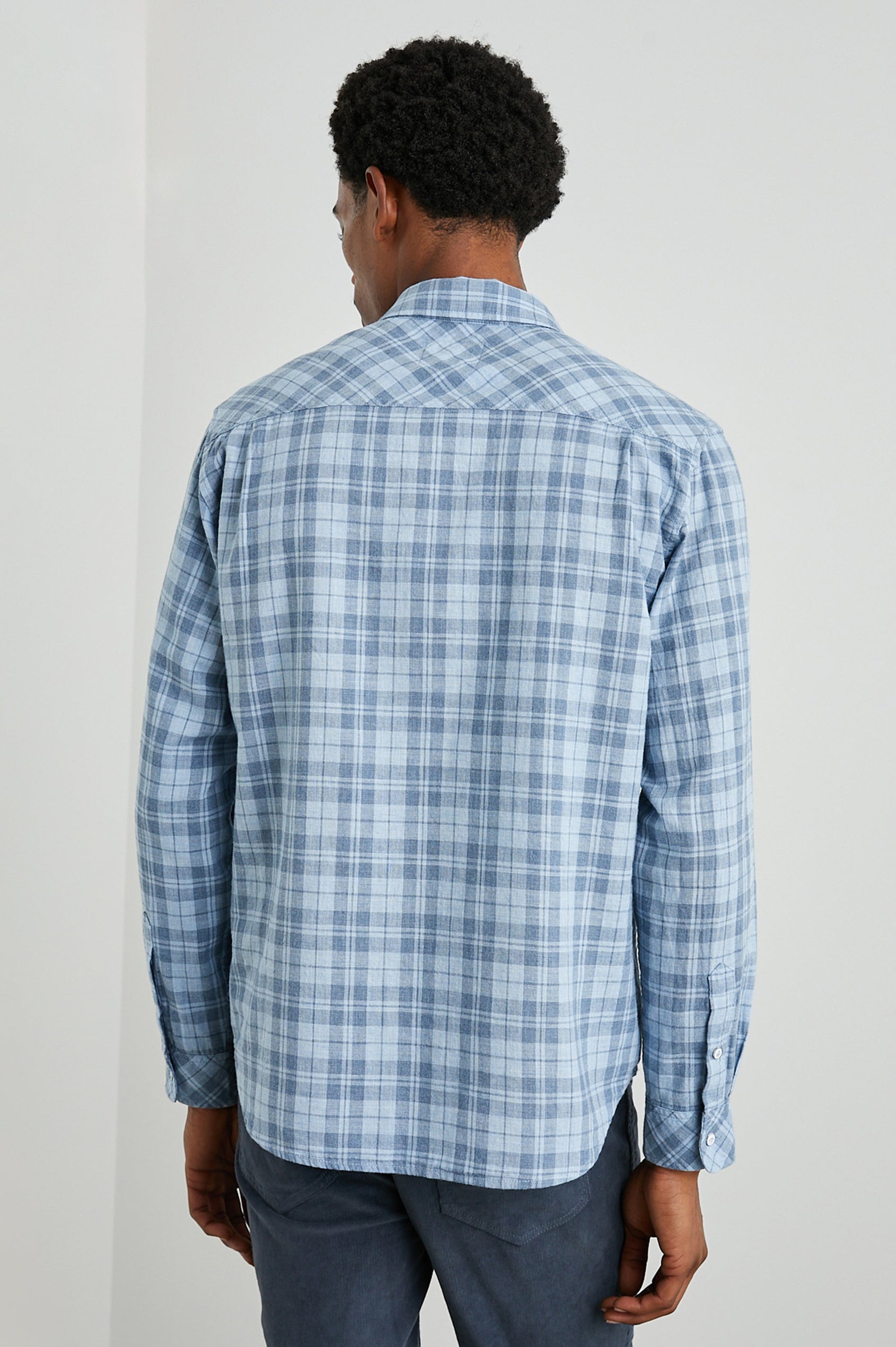 Wyatt Long-Sleeve Button Up with a Chest Patch Pocket in Sky Demin Heather Colorway, a plaid - Back View Featured on Model