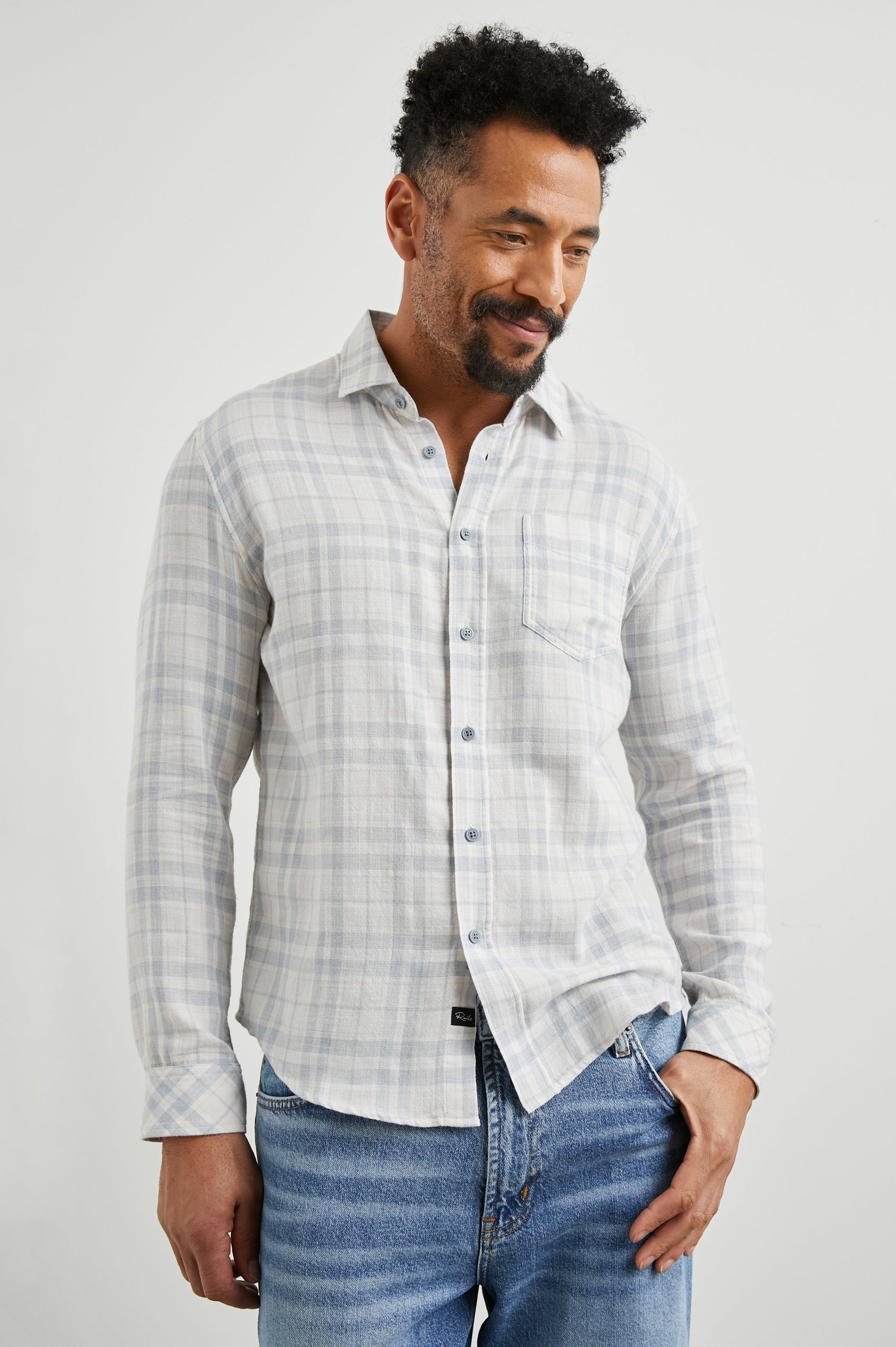 Wyatt Long-Sleeve Button Up with a Chest Patch Pocket in Slate Petal Colorway, a slate, petal and cream plaid - Front View Featured on Model