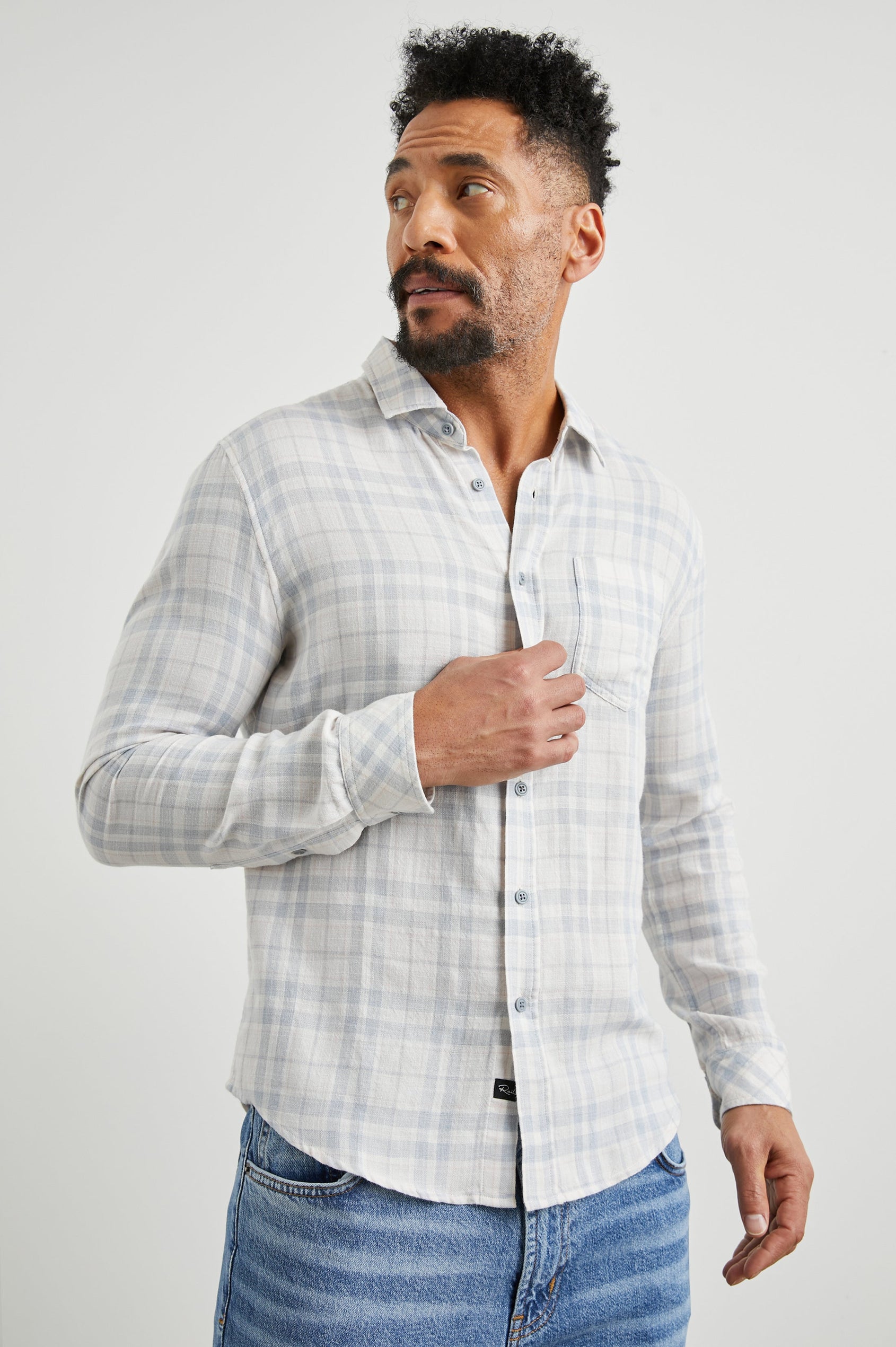 Wyatt Long-Sleeve Button Up with a Chest Patch Pocket in Slate Petal Colorway, a slate, petal and cream plaid - Front View Featured on Model