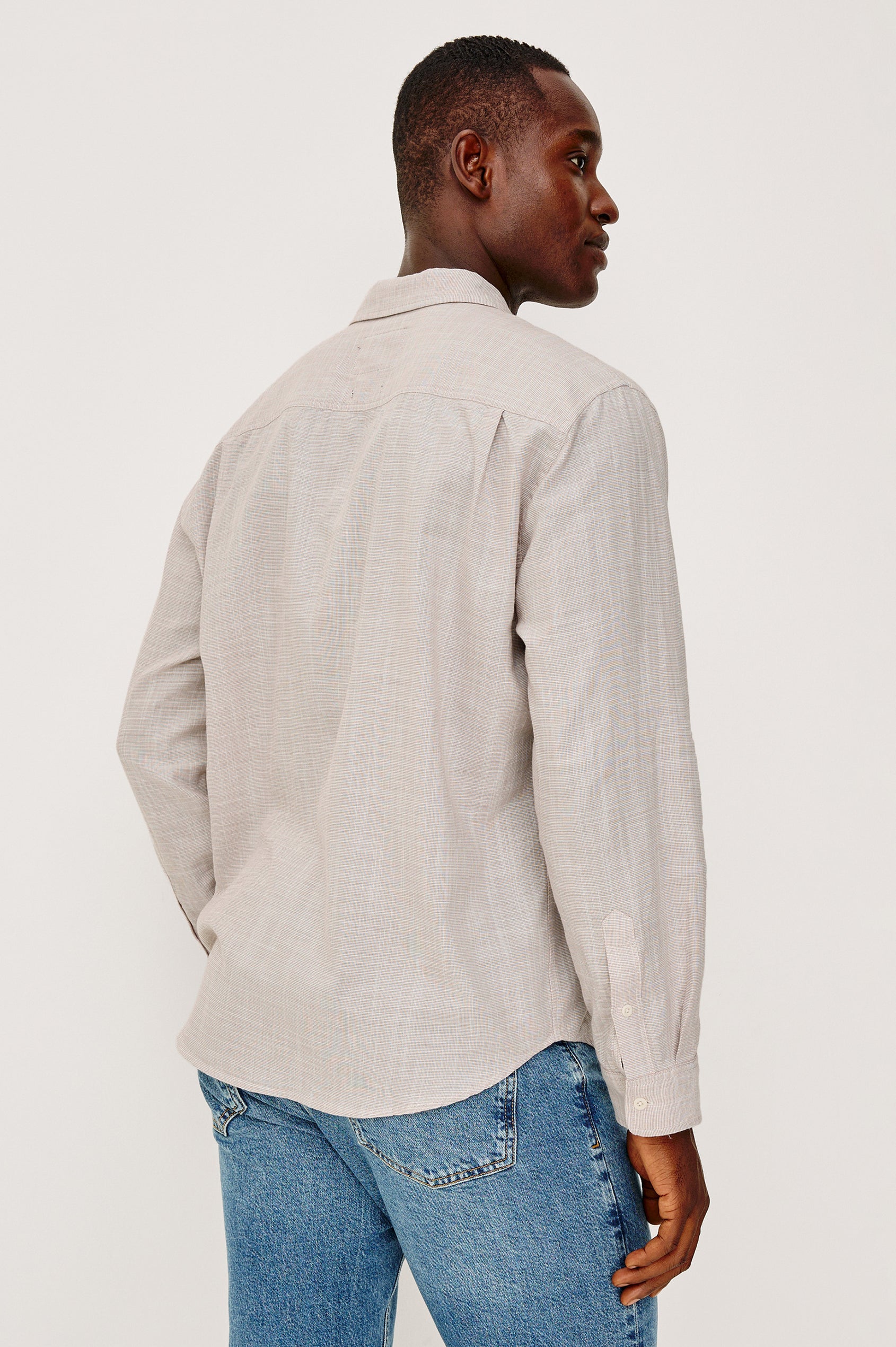 Wyatt Button Front Collared Shirt With Long Sleeves and Single Chest Pocket in Tahini Etch Colorway - Upper Body Back View Featured on Model