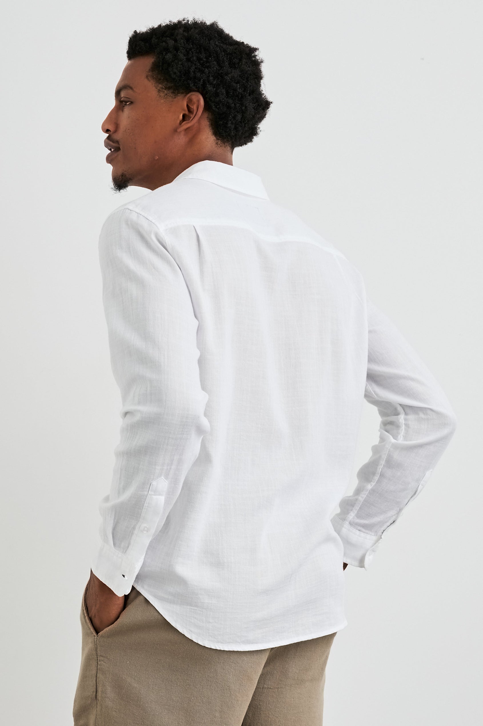 Wyatt Classic Button Up Long Sleeve Shirt with collar and front chest pocket in White - back view on model