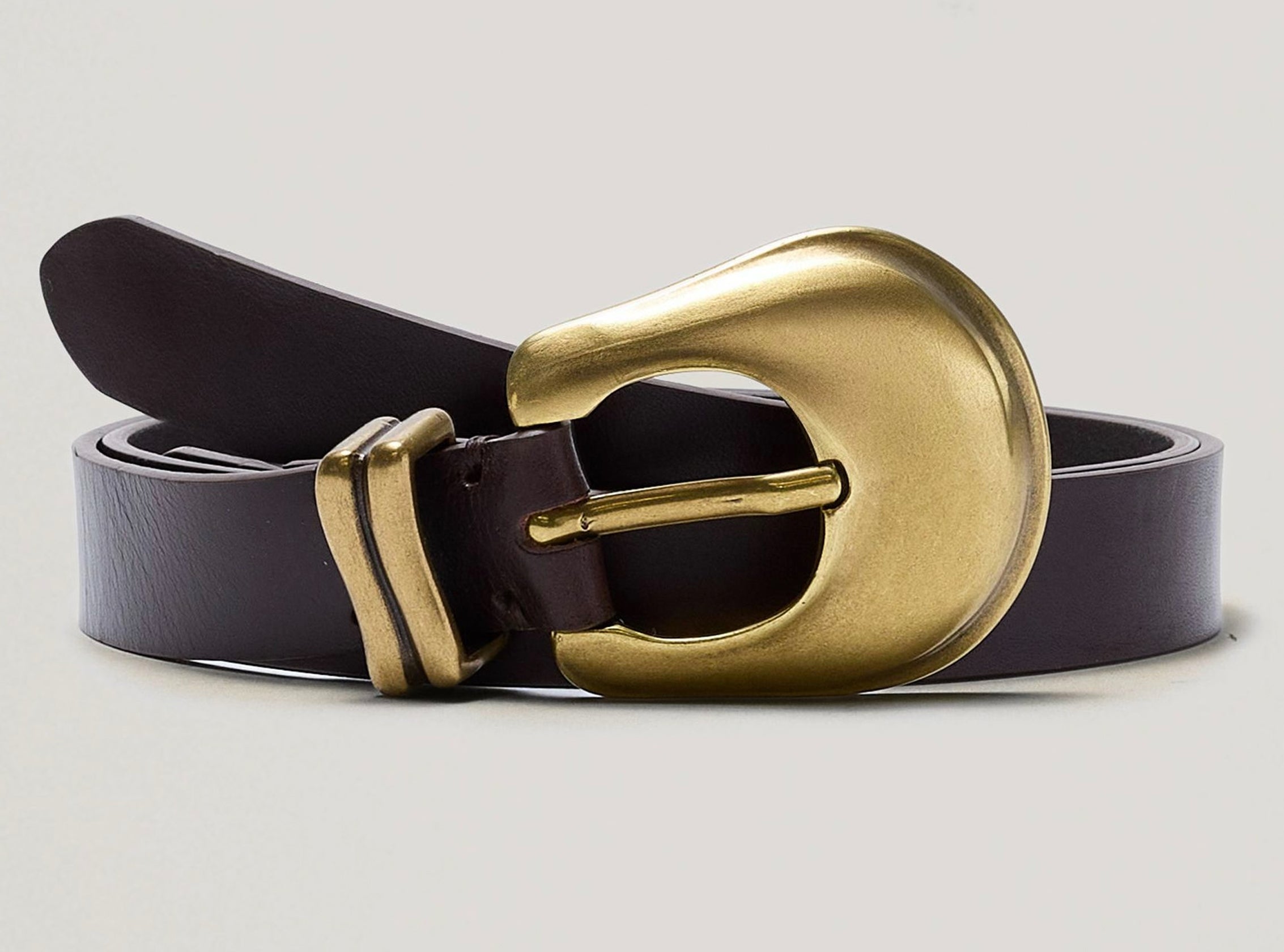 Brown belt with a gold buckle on a light gray background.