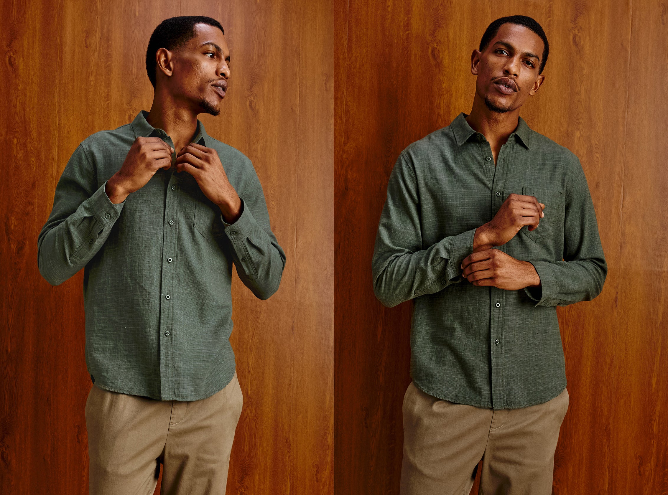 Man wearing a green button down shirt with brown pants posing against a brown wooden background.