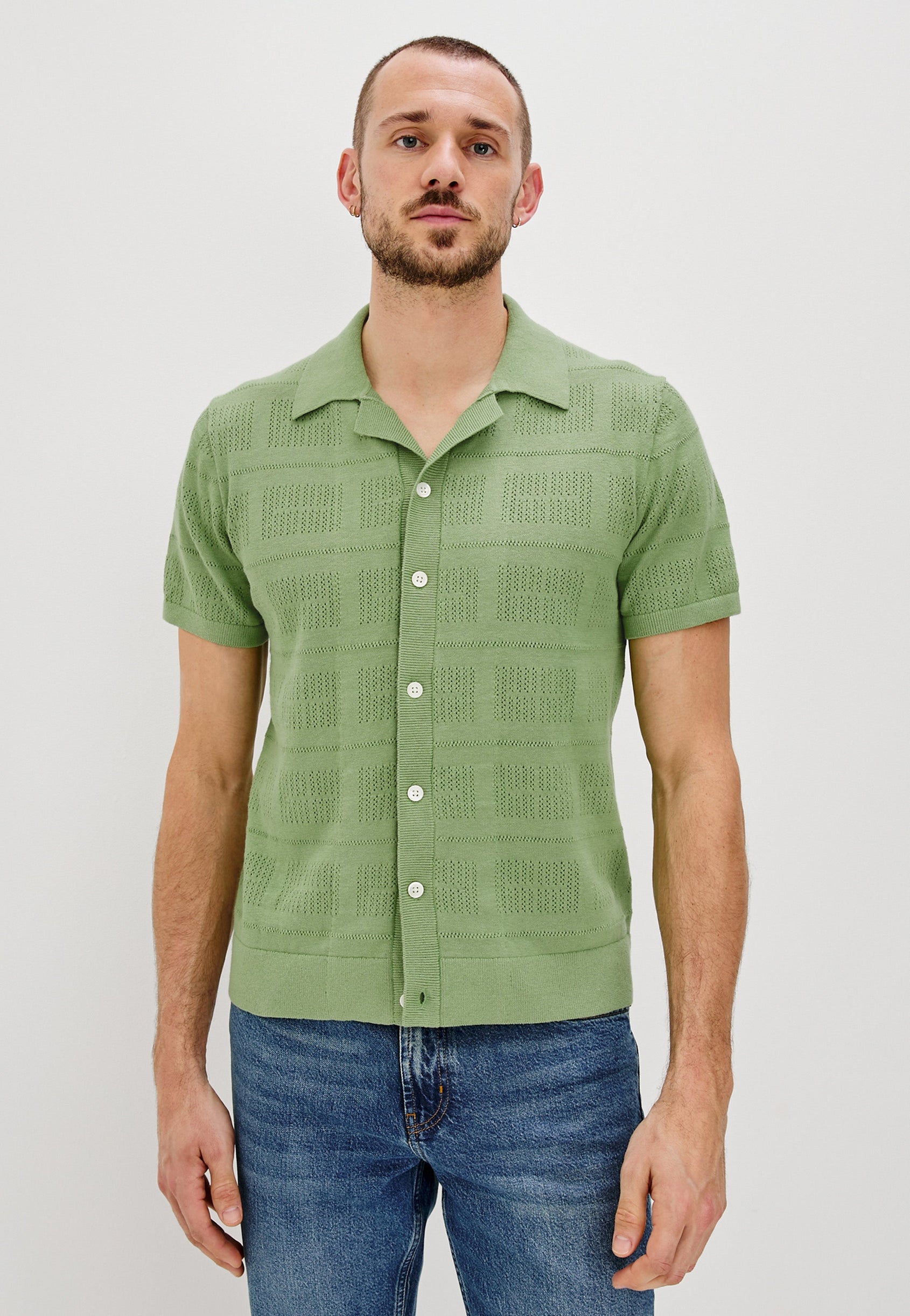 Yates Button Front Knit Shirt with Short Sleeves, a Relaxed Collar and Lapel, Ribbed Sleeve Cuff, Collar, Hem and Front Button Placket in Matcha Colorway. Front View Shown on Model.