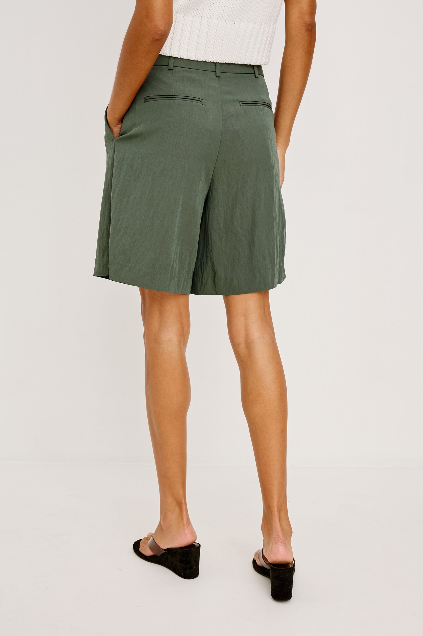Zamora High-Waist Mid-Length Short With Front Zip Fly, Belt Loops, and Front Pleats in Ivy Colorway - Lower Body Back View Featured on Model