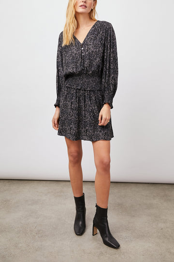 Zana Long-Sleeve Mini Dress with a V Neck, Smocked Cuffs and Waist, and Buttons Down the Bodice in Charcoal Abstract Animal Colorway, Animal Patterns in Charcoal and Black - Front Full Body View Featured on Model