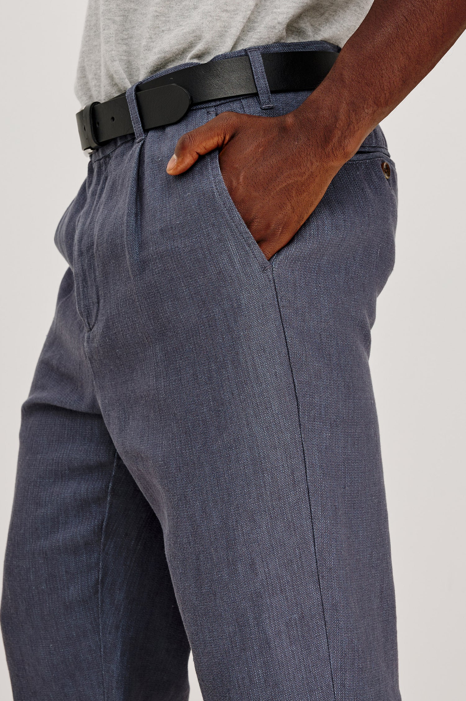 Zimmer Pant in Cotton Linen Wool Blend With Relaxed Fit, Tapered Leg, Side Pockets, Zip Fly, Belt Loops, and Back Welt Pockets in Meridian Colorway - Lower Body Close Up View Featured on Model
