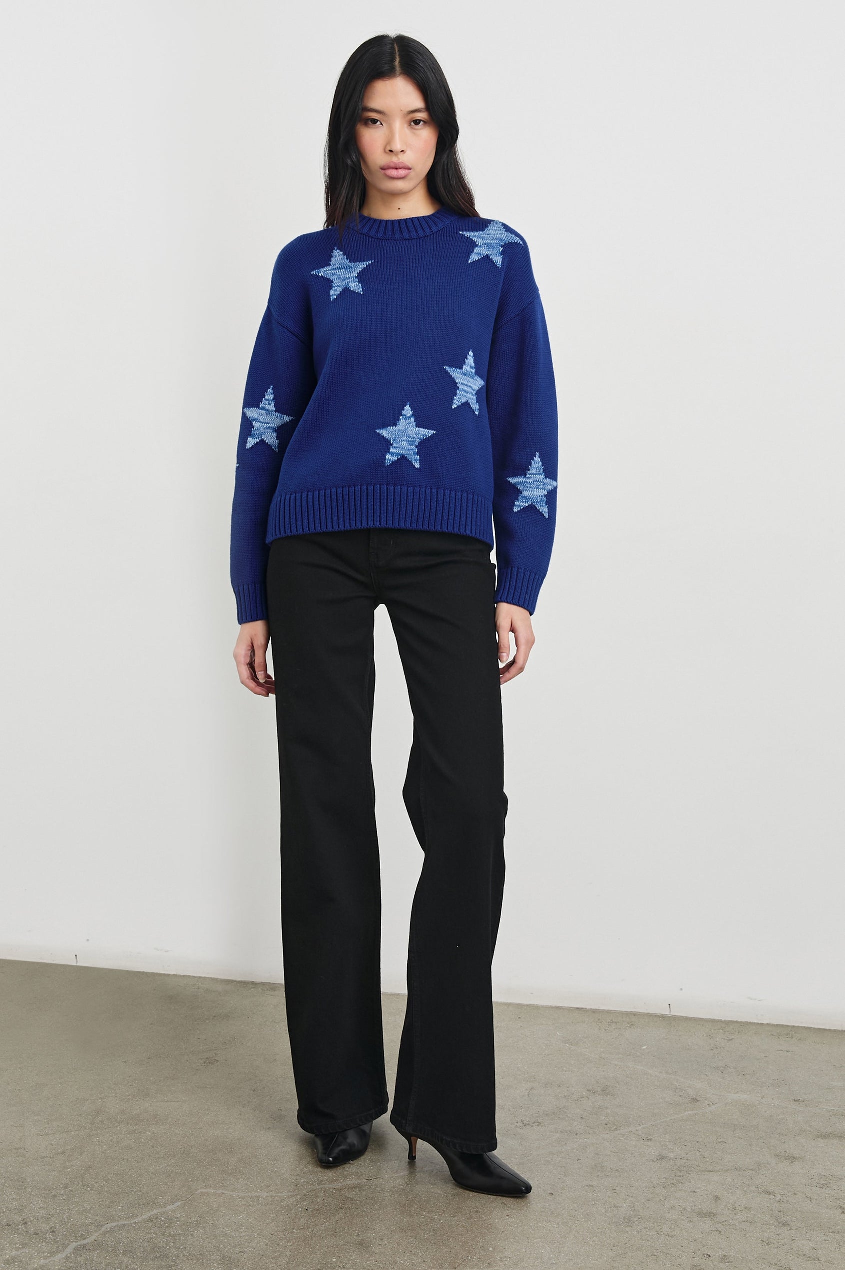 Zoey Long-Sleeve Sweater with Crewneck and Ribbed Trims in Cobalt Galaxy Colorway, with light blue stars on cobalt - Front Full Body View Featured on Model