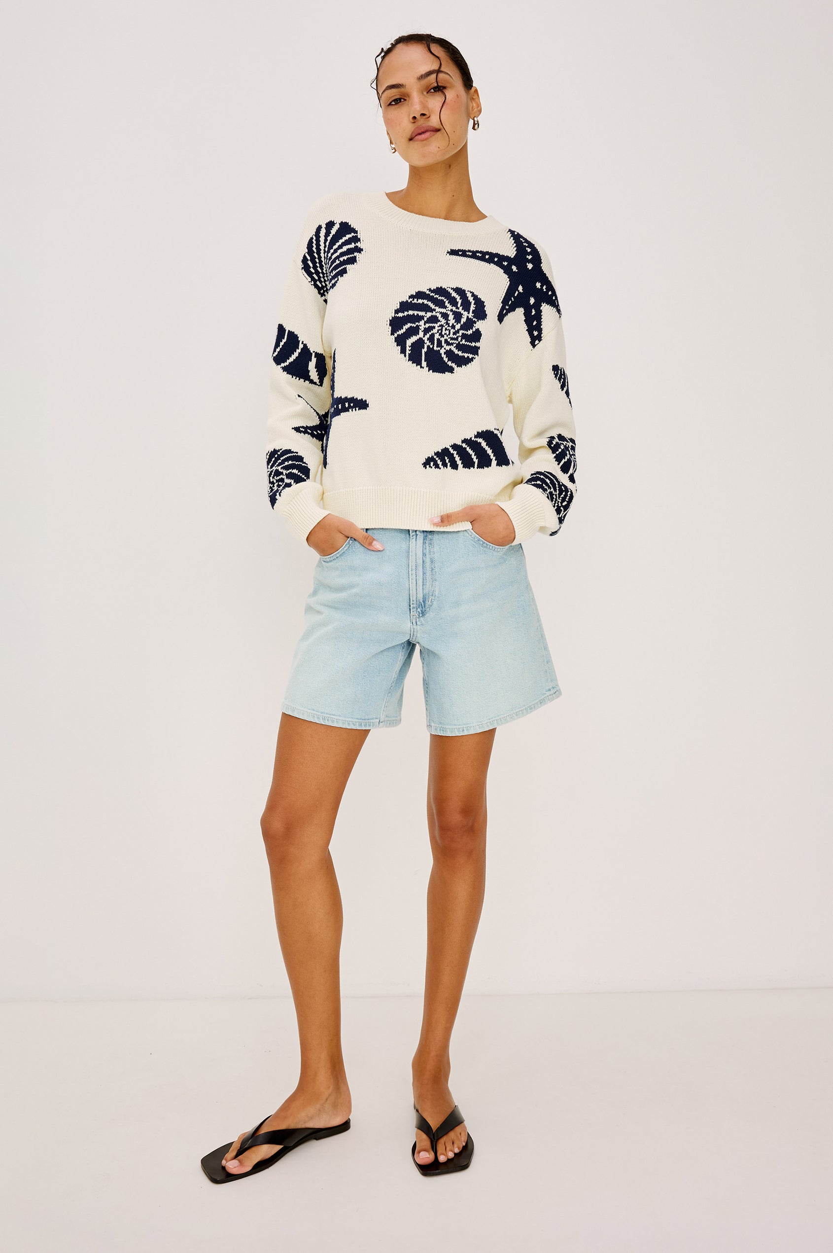 Zoey Crewneck Sweater in Cotton Blend Knit With Seashell Embroidery Long Sleeves Relaxed Fit and Ribbed Trim - Full Body Front View Featured on Model