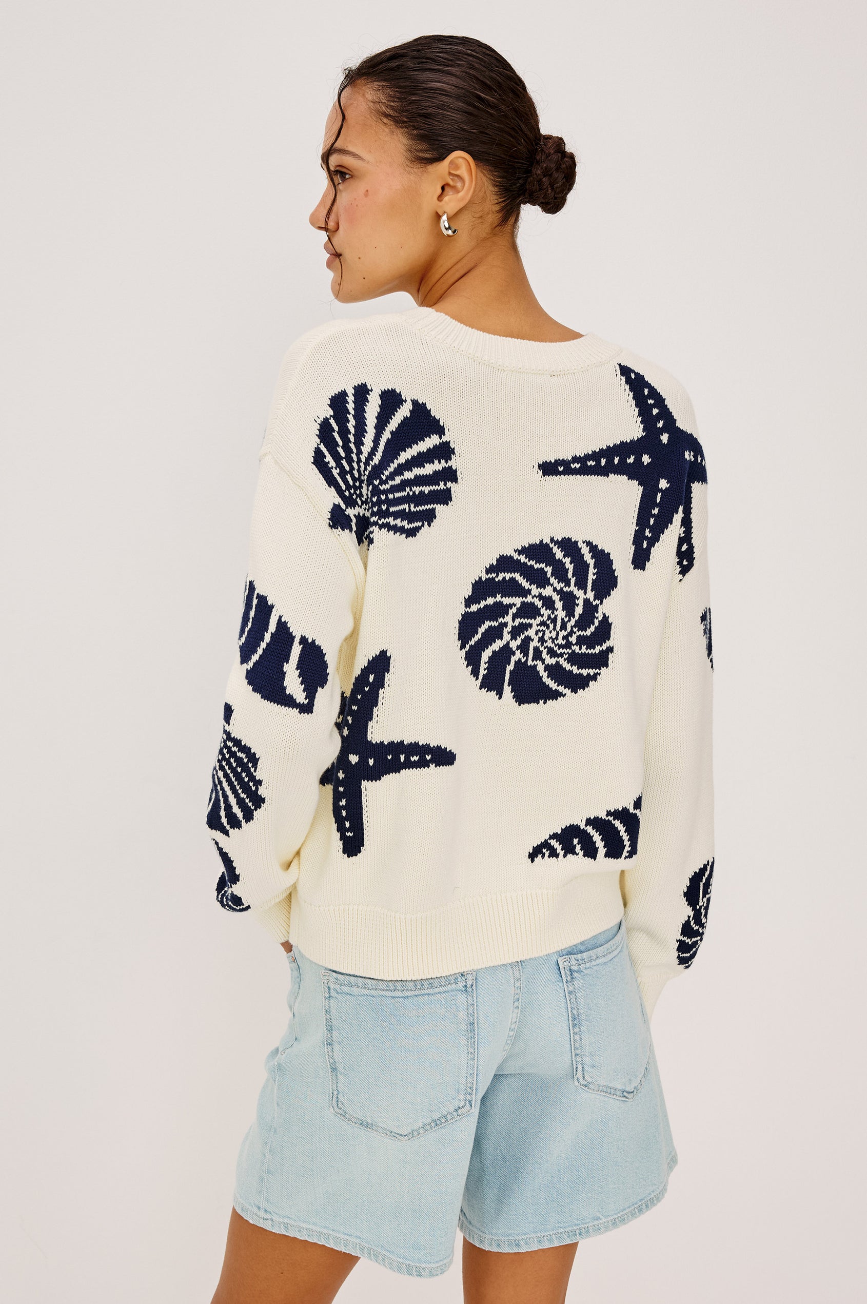 Zoey Crewneck Sweater in Cotton Blend Knit With Seashell Embroidery Long Sleeves Relaxed Fit and Ribbed Trim - Upper Body Back View Featured on Model