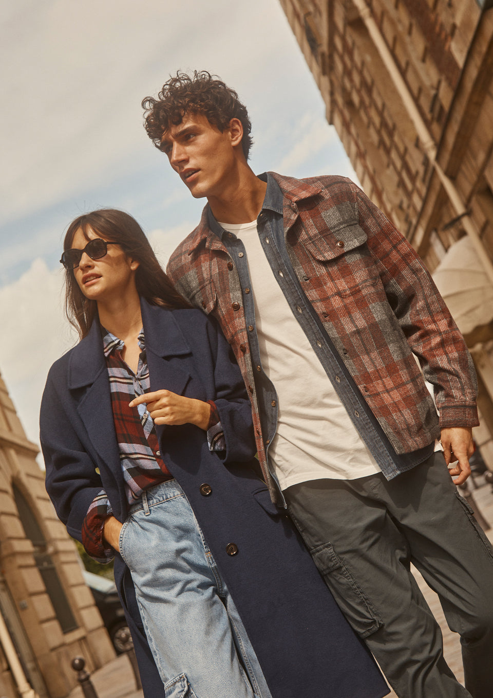 FRONT EDITORIAL IMAGE OF TWO MODELS. FIRST MODEL IS WEARING MARTA COAT, HUNTER SHIRT, AND SPEEDWAY CARGO PANT. SECOND MODEL IS WEARING VIGGO SHIRT JACKET AND EMMERSON PANT.