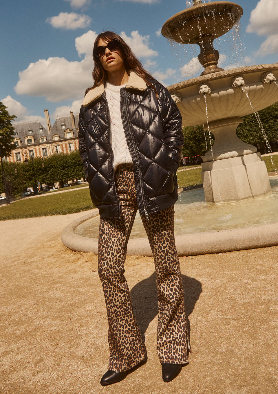 FULL BODY EDITORIAL IMAGE OF MODEL WEARING SHAY JACKET, ALEXIS SWEATER, AND SUNSET SLIM BOOT JEAN