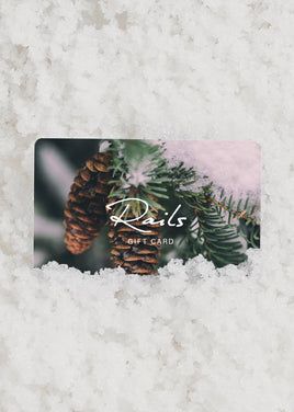 EDITORIAL IMAGE OF GIFT CARD IN THE SNOW
