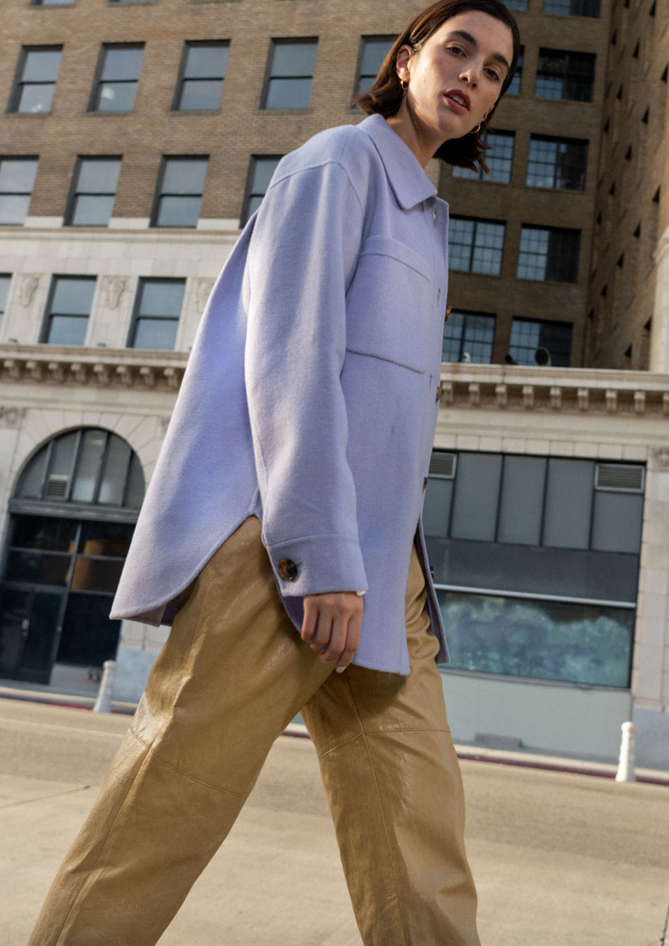 Side editorial image of model wearing Connie Shirt Jacket and Jo Pant
