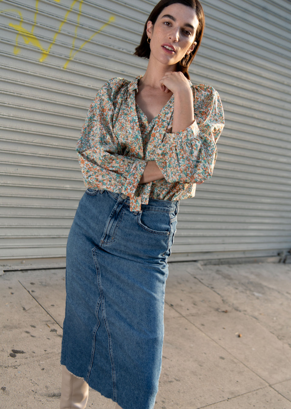 Front editorial image of model wearing Amal Top and Highland Skirt