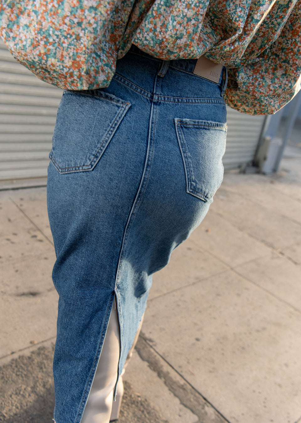 Back editorial image of model wearing Highland Skirt