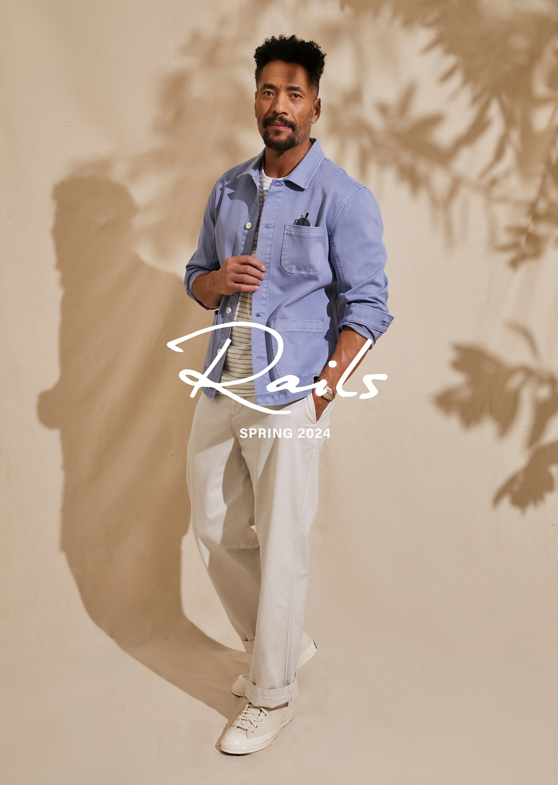 FRONT FULL BODY EDITORIAL IMAGE OF MODEL WEARING LUC JACKET AND GARRETT PANT