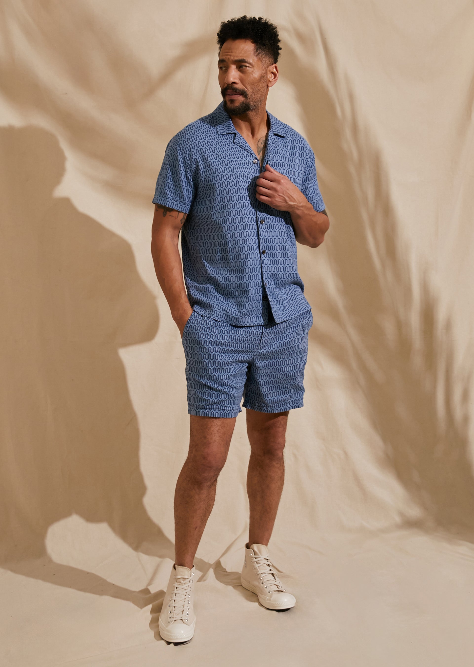 FRONT FULL BODY EDITORIAL IMAGE OF MODEL WEARING WAIMEA SHIRT AND SONA SHORT