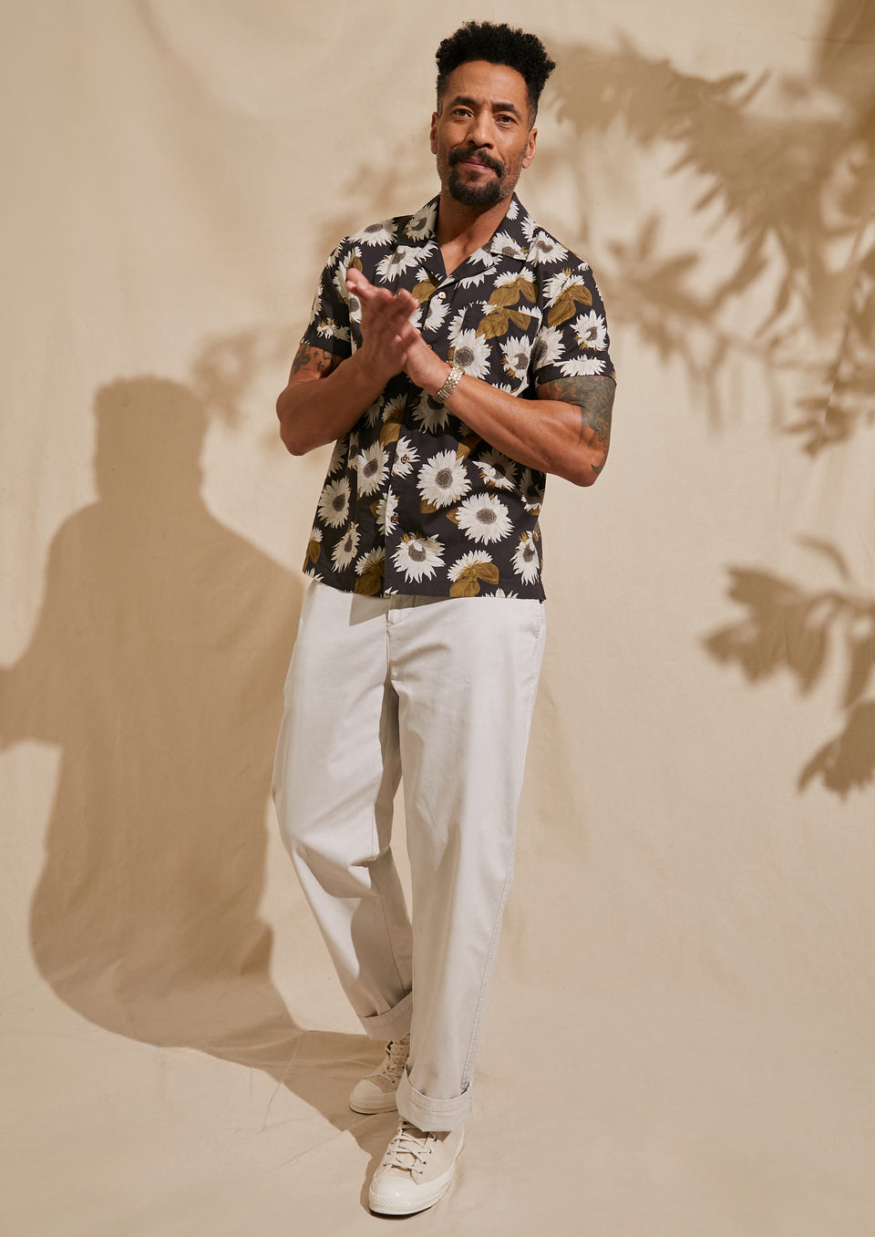 FRONT FULL BODY EDITORIAL IMAGE OF MODEL WEARING MORENO SHIRT AND GARRETT PANT