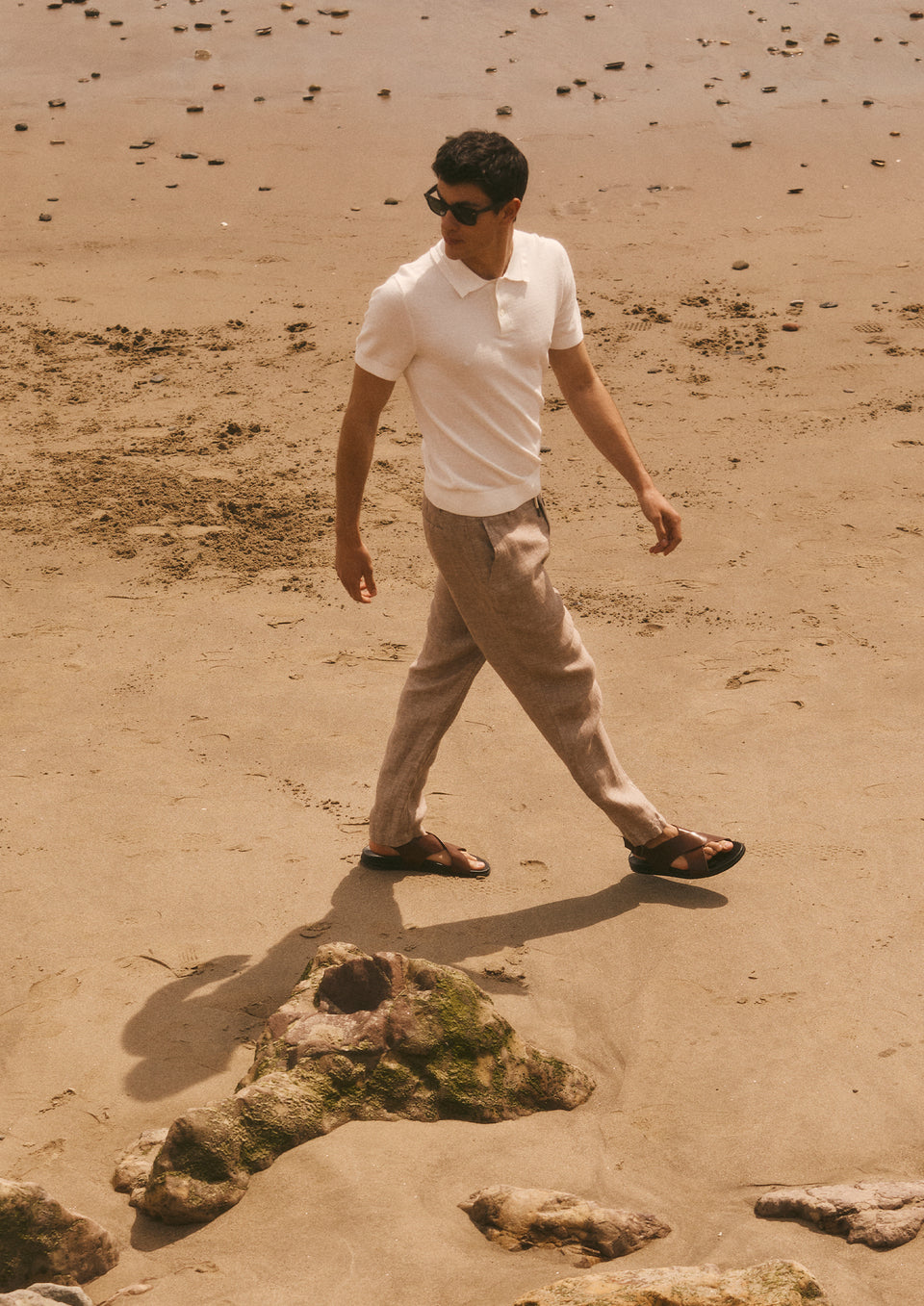 Full Body editorial image of model wearing Shoreditch Polo Shirt and Mercer Pants