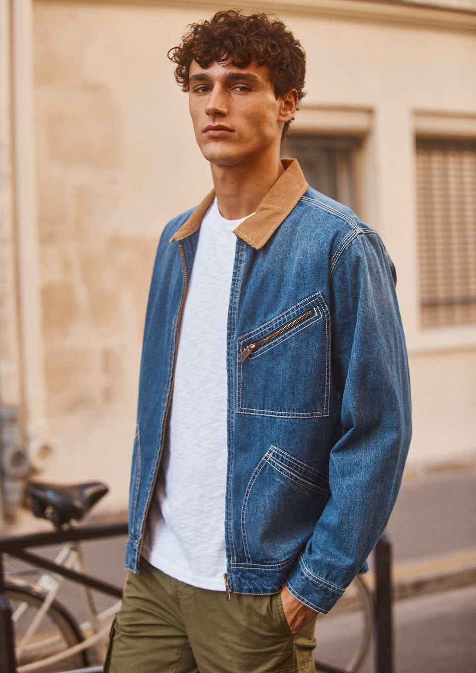 FRONT EDITORIAL IMAGE OF MODEL WEARING KETTER JACKET. 