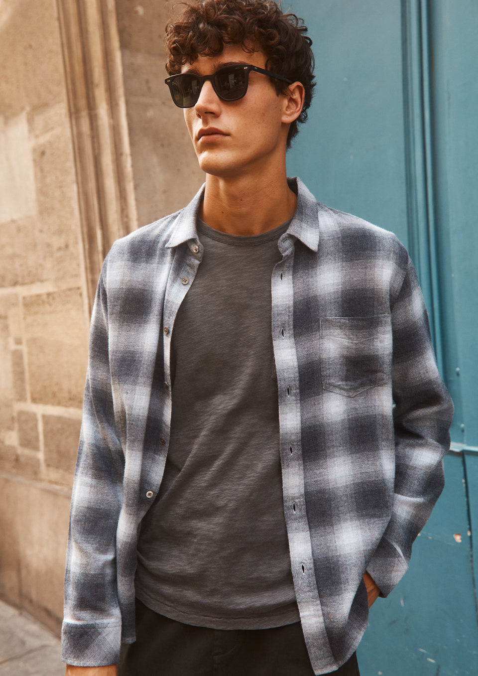 FRONT EDITORIAL IMAGE OF MODEL WEARING LENNOX SHIRT AND SKIPPER T-SHIRT