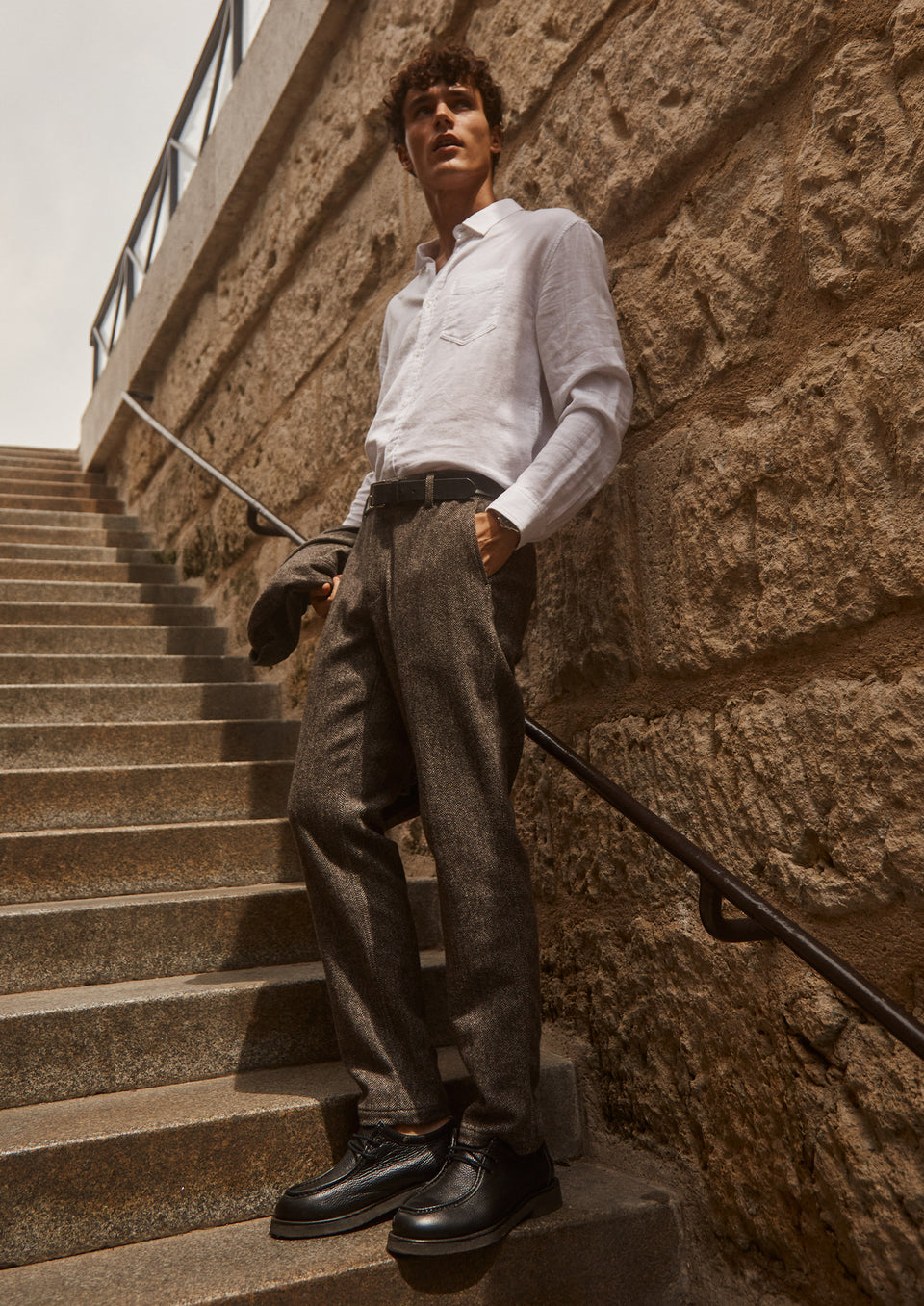 SIDE EDITORIAL IMAGE OF MODEL WEARING WYATT SHIRT AND THOMAS PANT